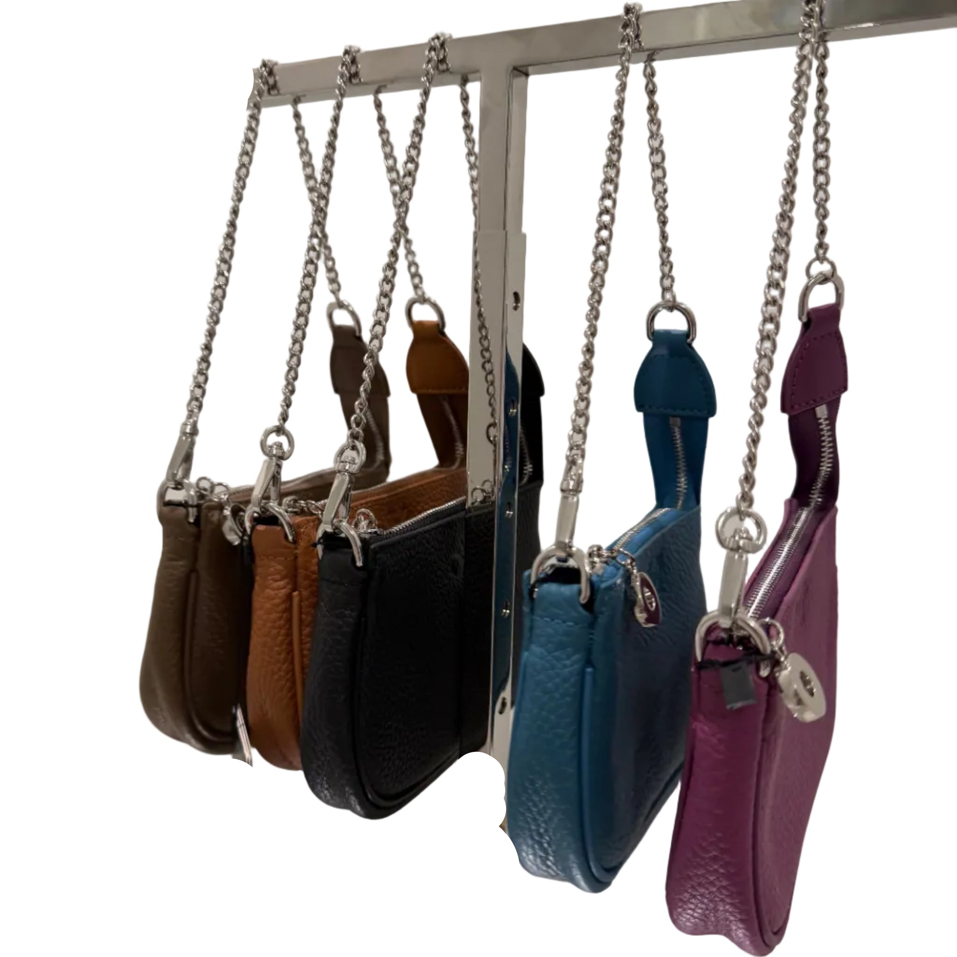 Collection of small handbags on a metal rack with a white background