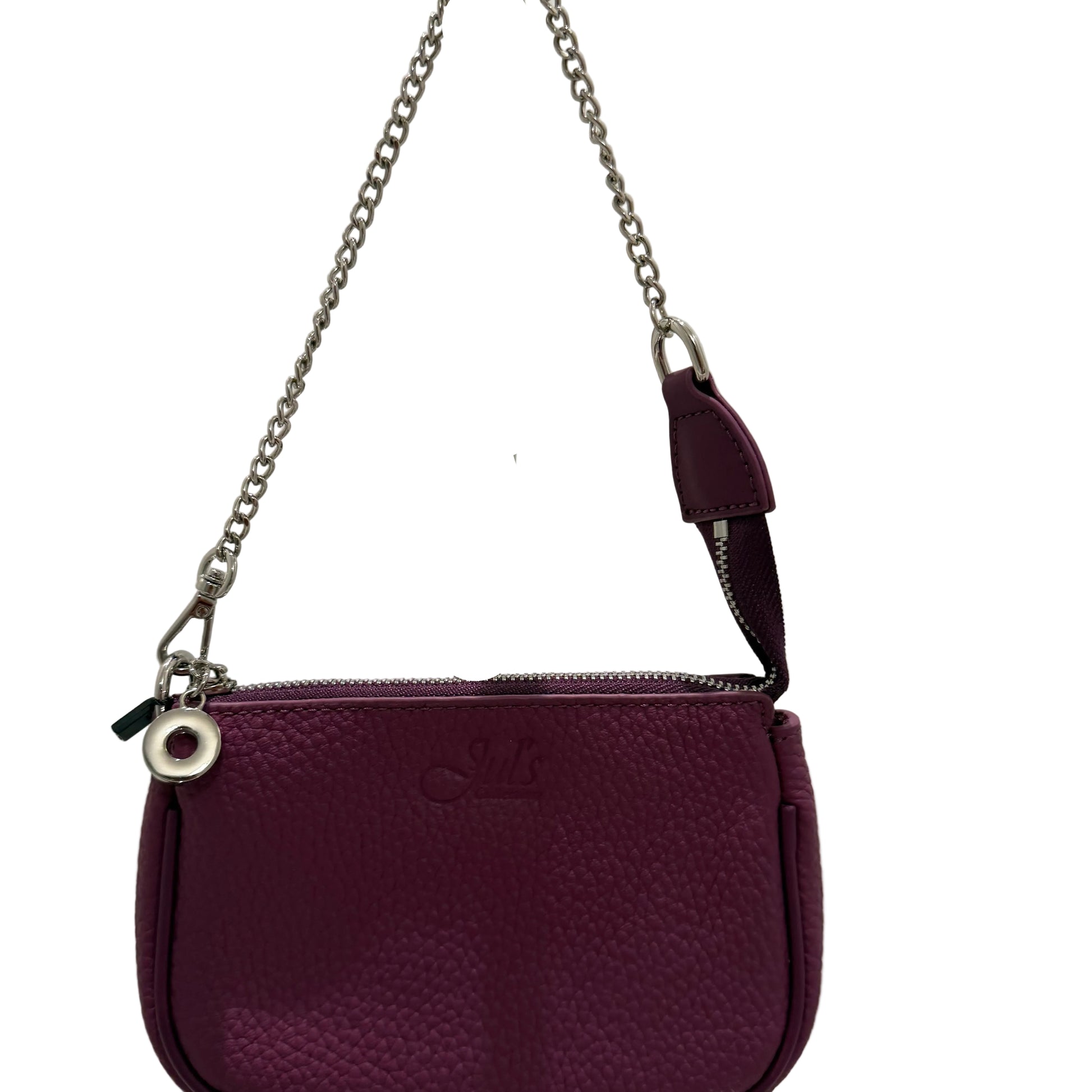 Purple handbag with a chain strap on a reflective surface