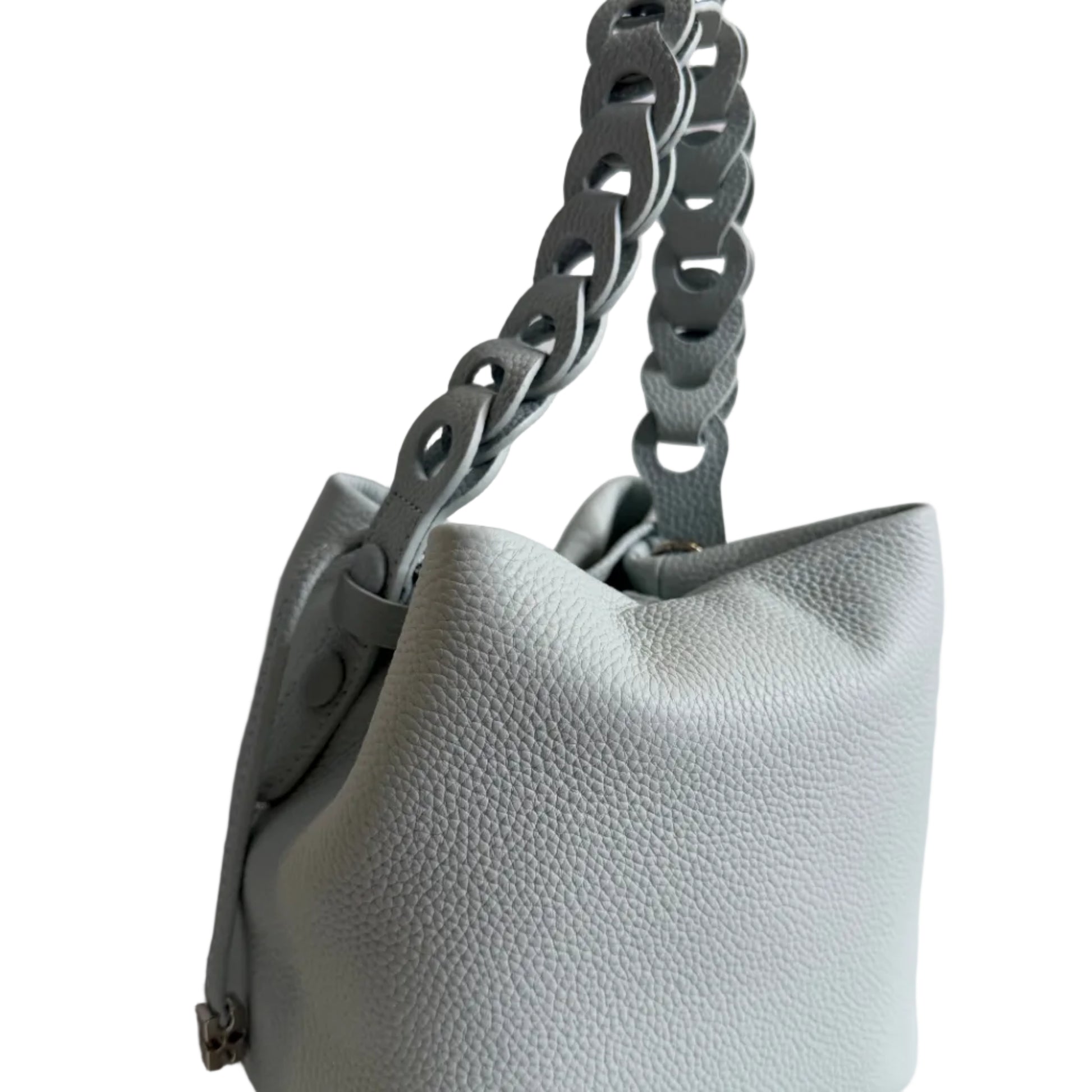 Light blue handbag with a silver chain detail on a white background