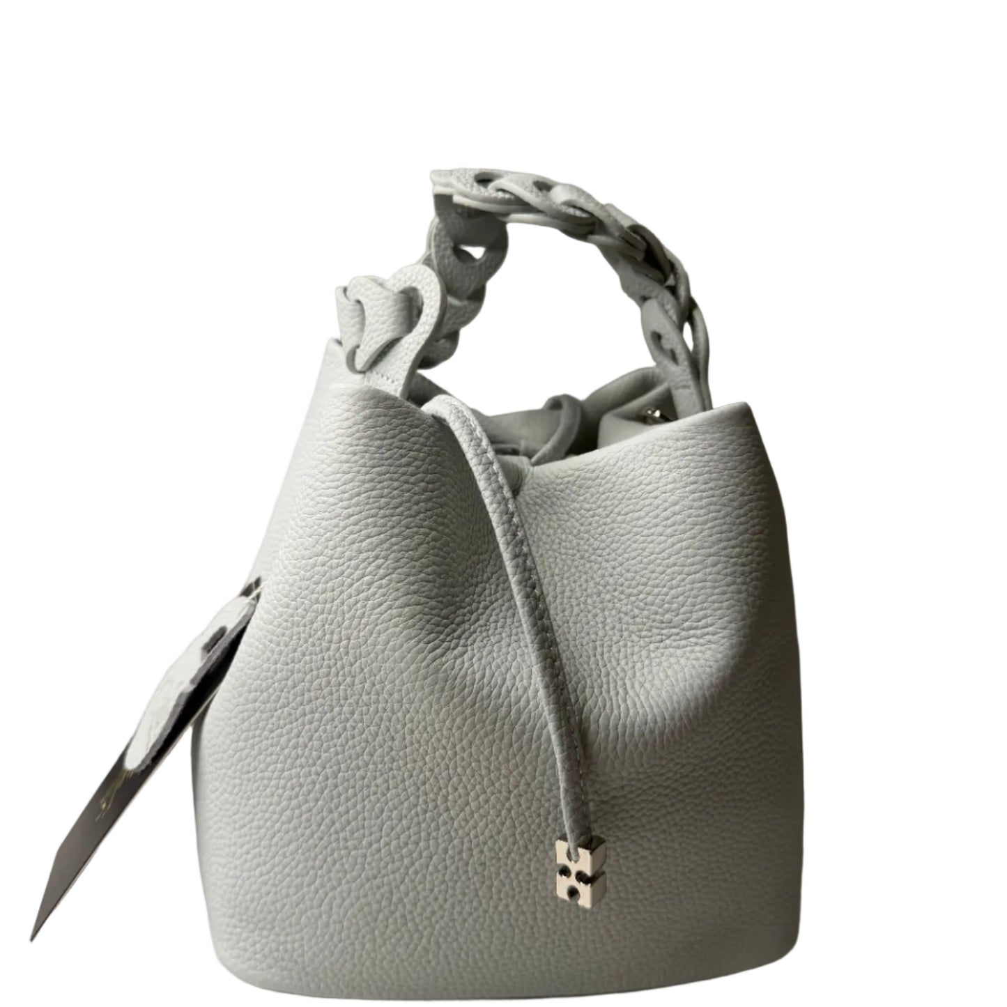Light gray handbag with a gold clasp on a neutral background