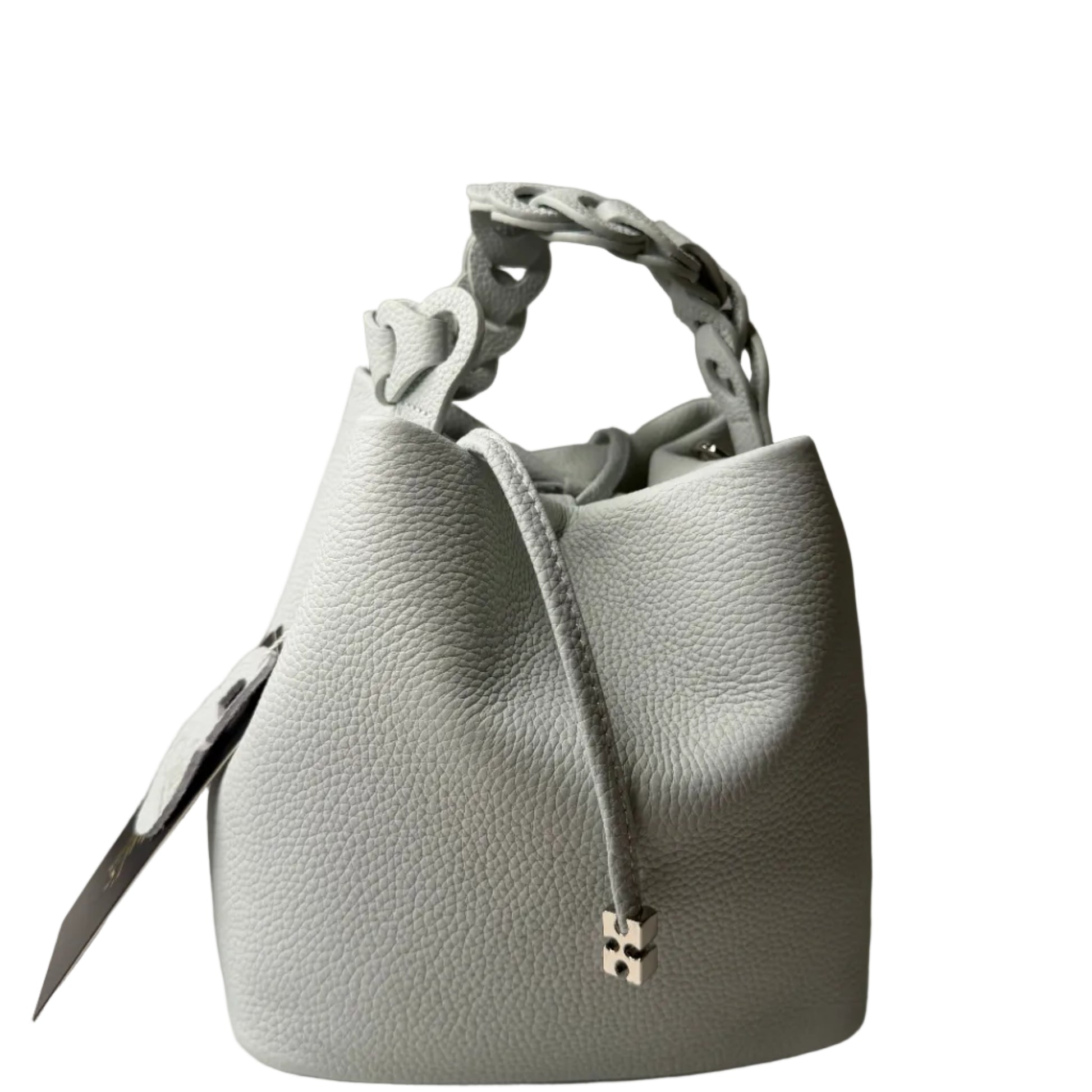 Light gray handbag with a gold clasp on a neutral background