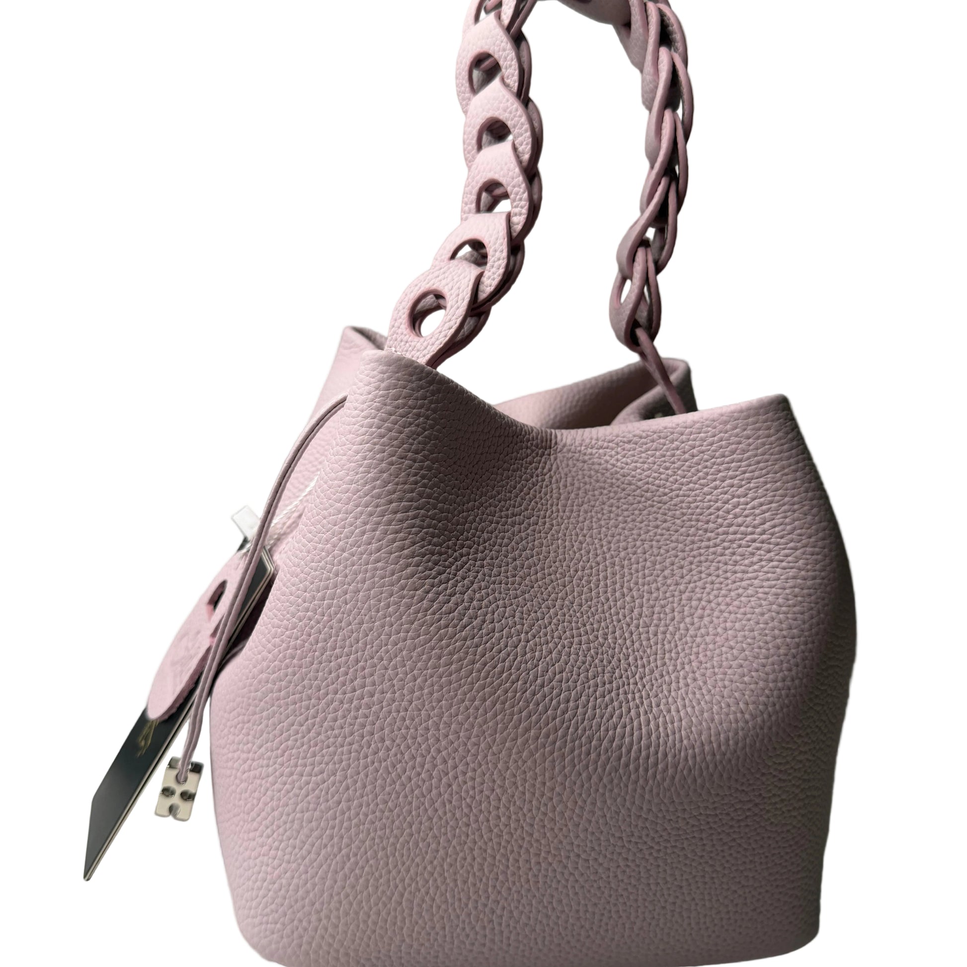 Pink handbag with braided handle on a light gray background