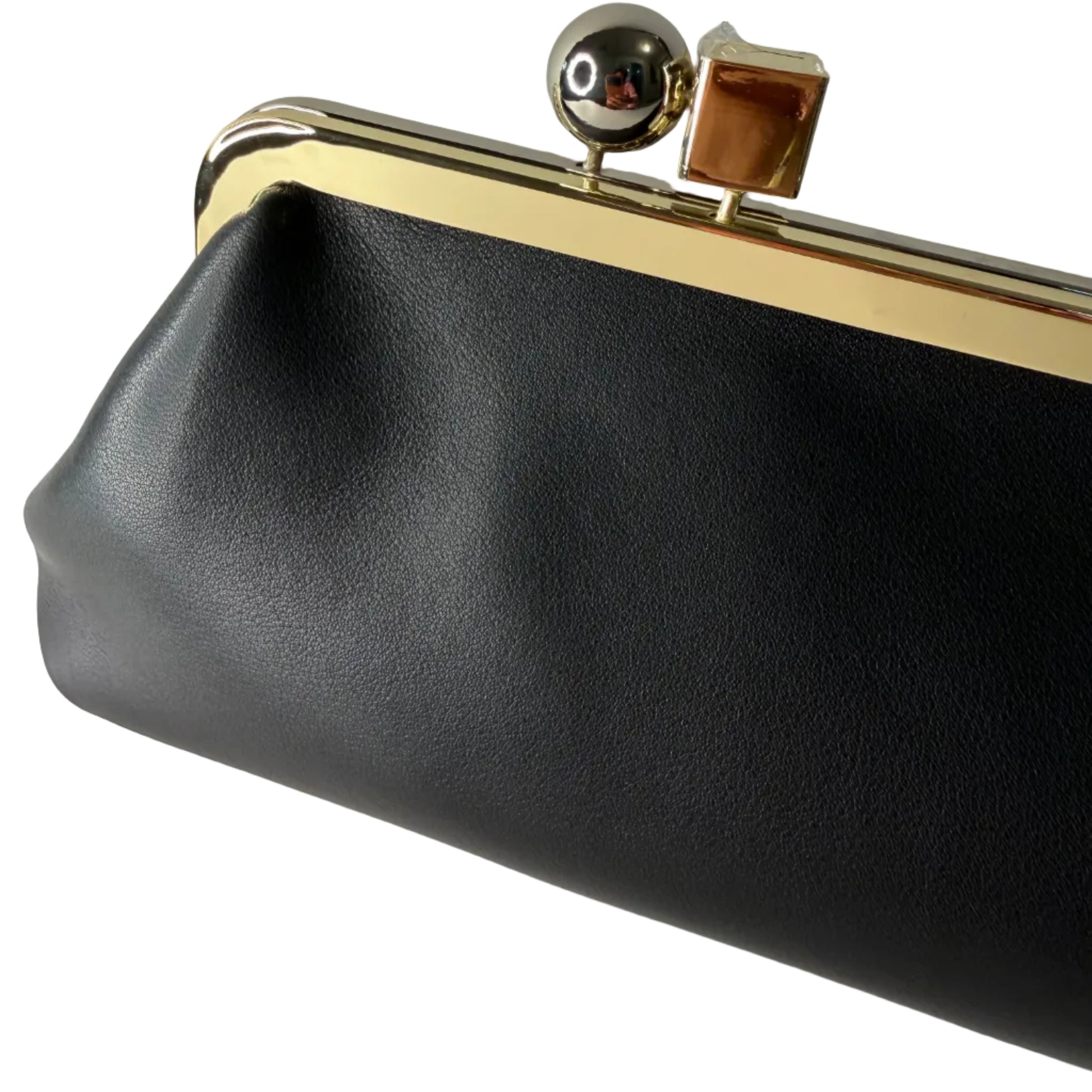 Black clutch bag with gold clasp on a light gray background