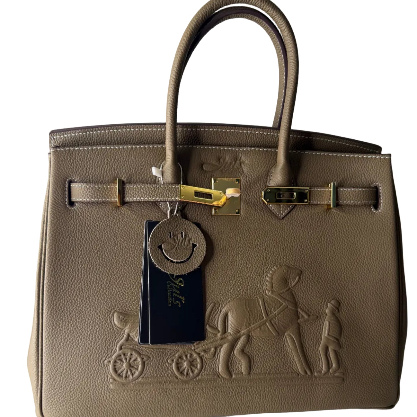 Brown handbag with embossed design on a white surface