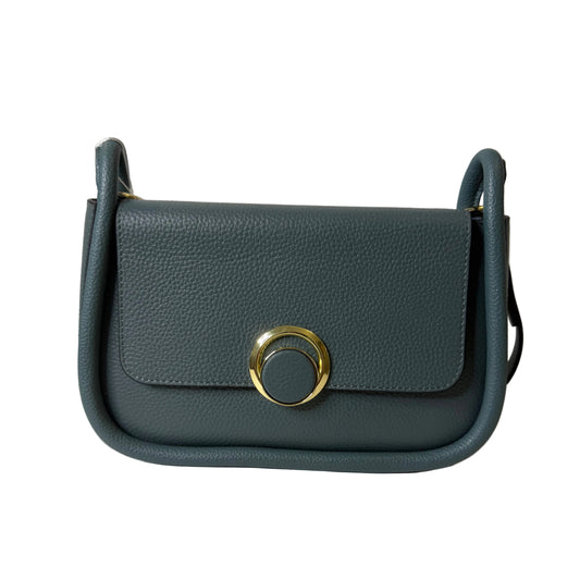 Gray leather wallet with a gold clasp on a light gray background