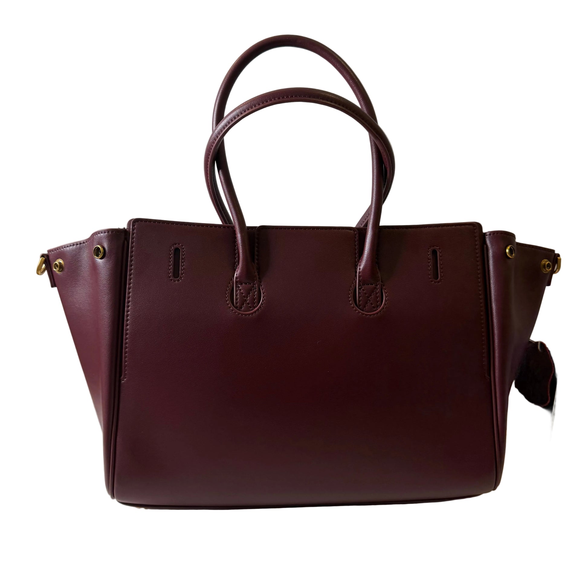 Brown leather handbag on a white surface