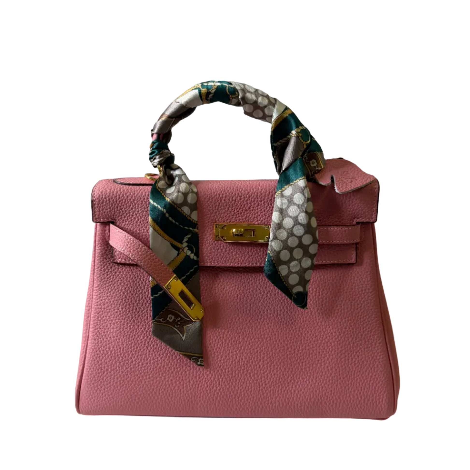 Pink handbag with a patterned handle on a white background