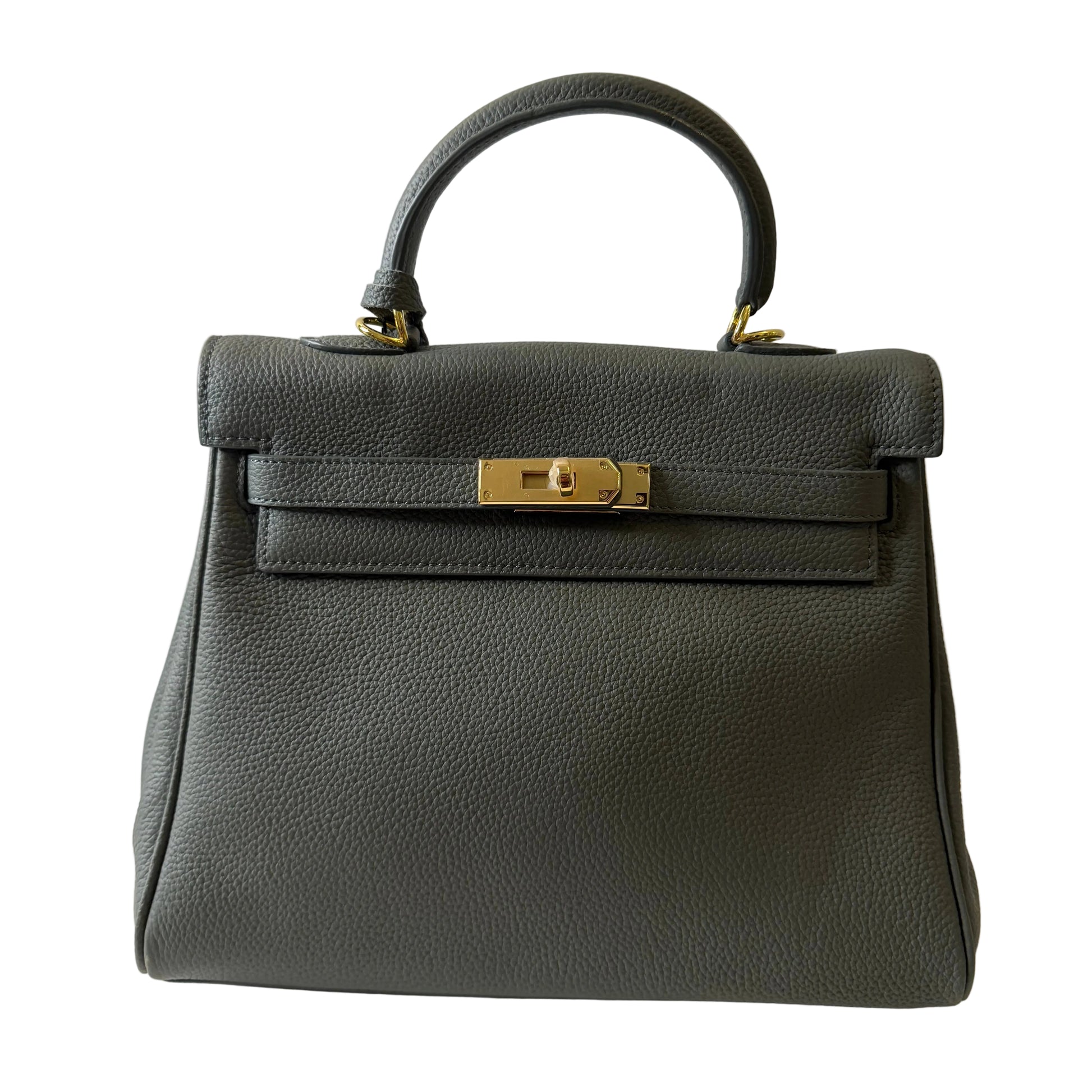 Black handbag with gold clasp on a light gray background