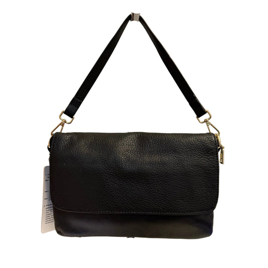 Black leather handbag on a stand against a white background