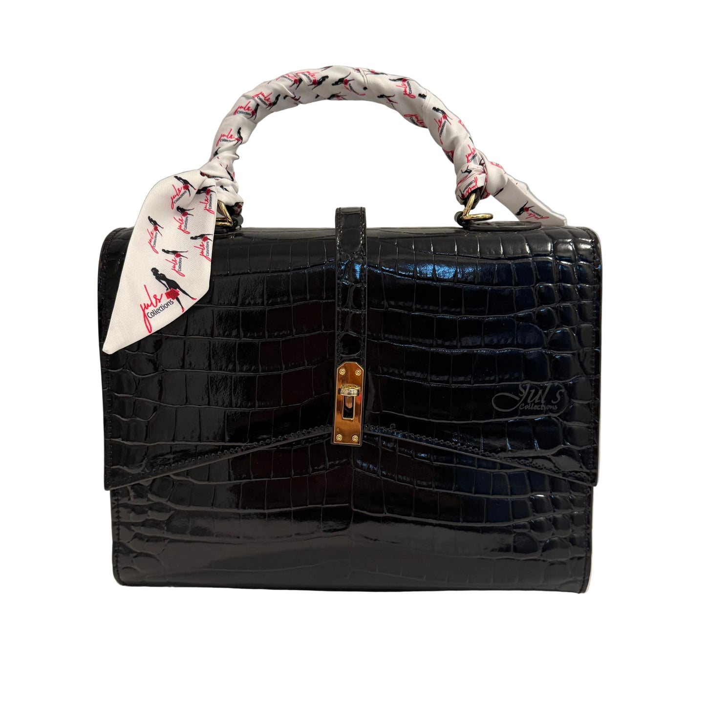 Black crocodile-patterned handbag with a decorative handle on a light gray background