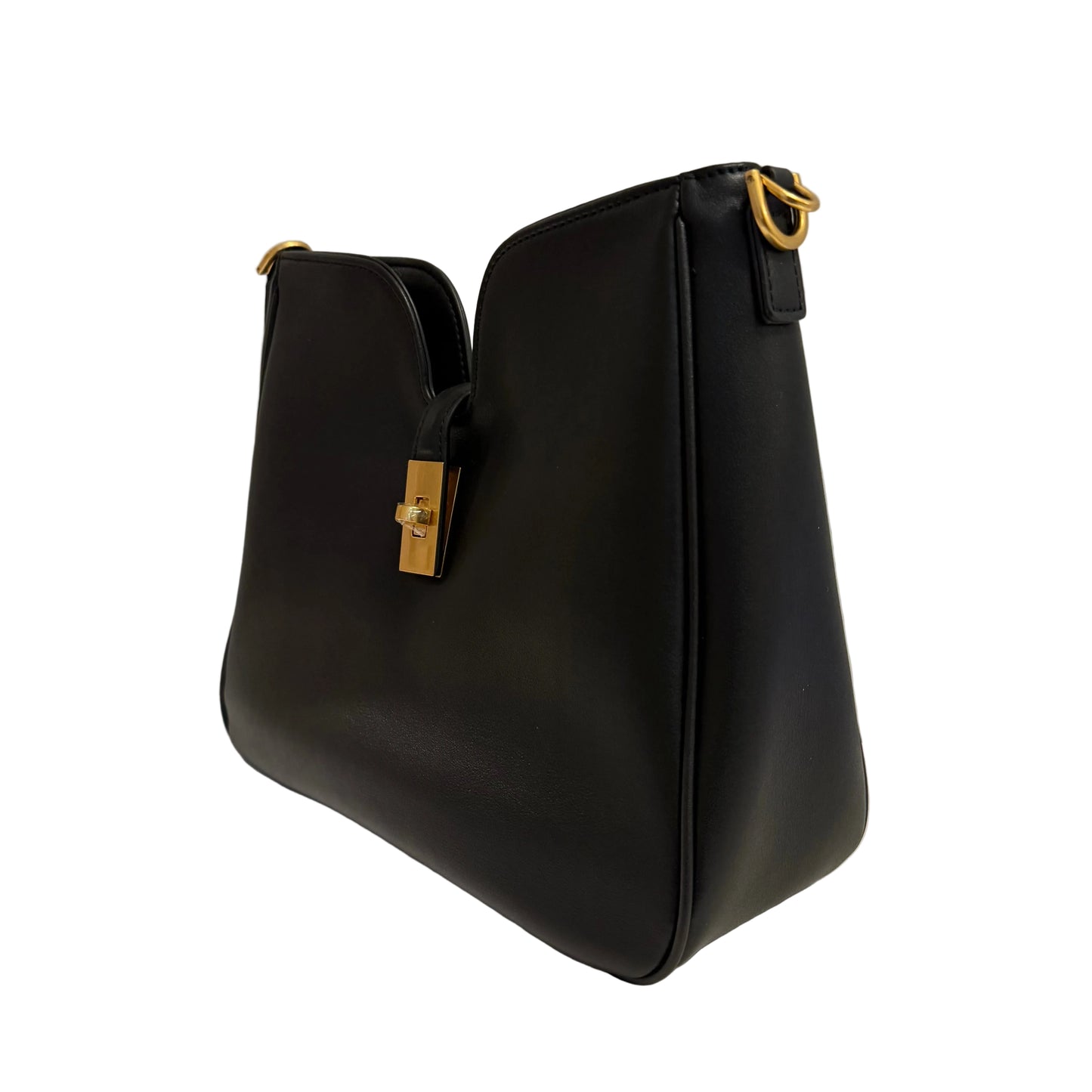 Black handbag with gold accents on a light gray background