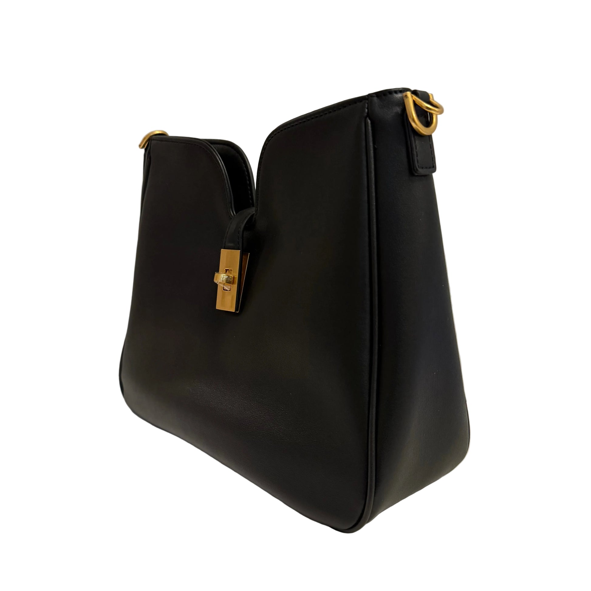 Black handbag with gold accents on a light gray background