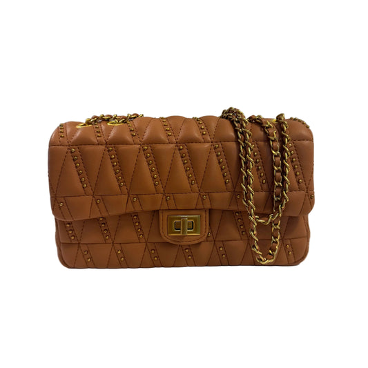 Brown quilted handbag with gold chain strap on a white surface