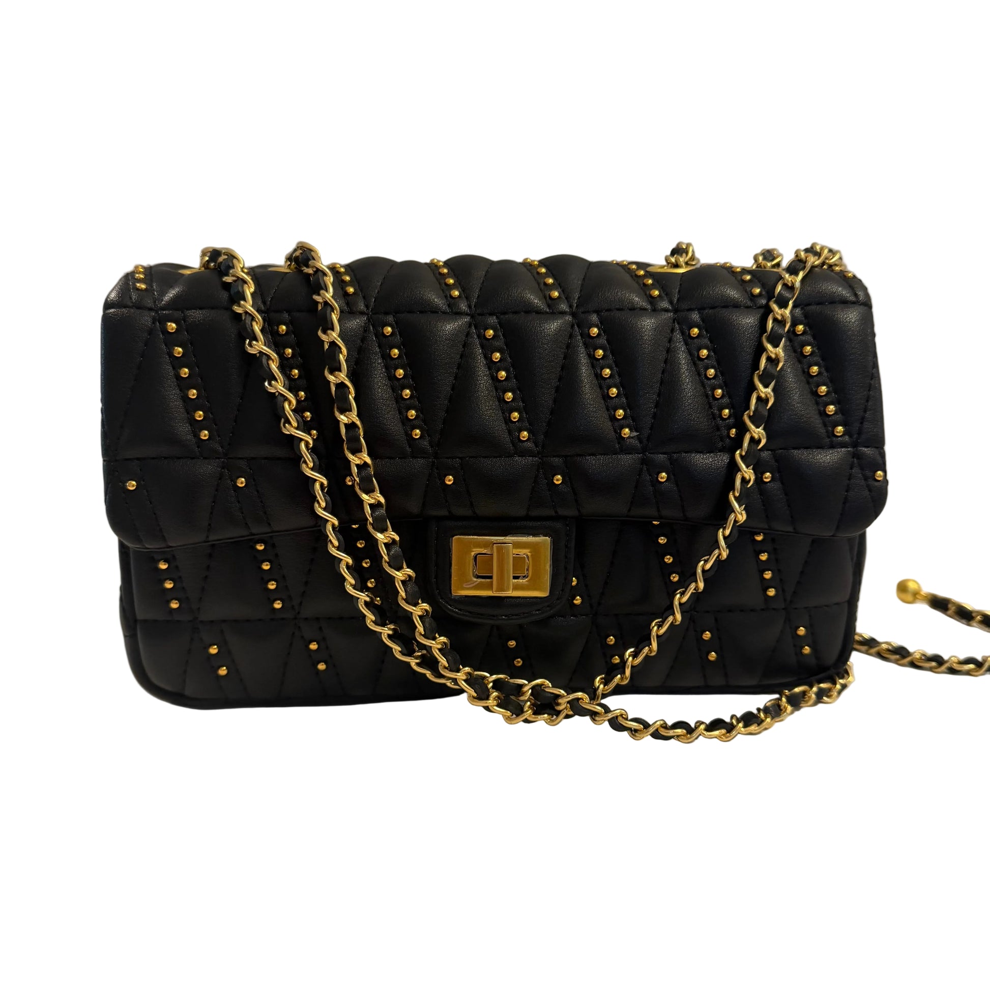 Black quilted handbag with gold chain strap on a light gray background
