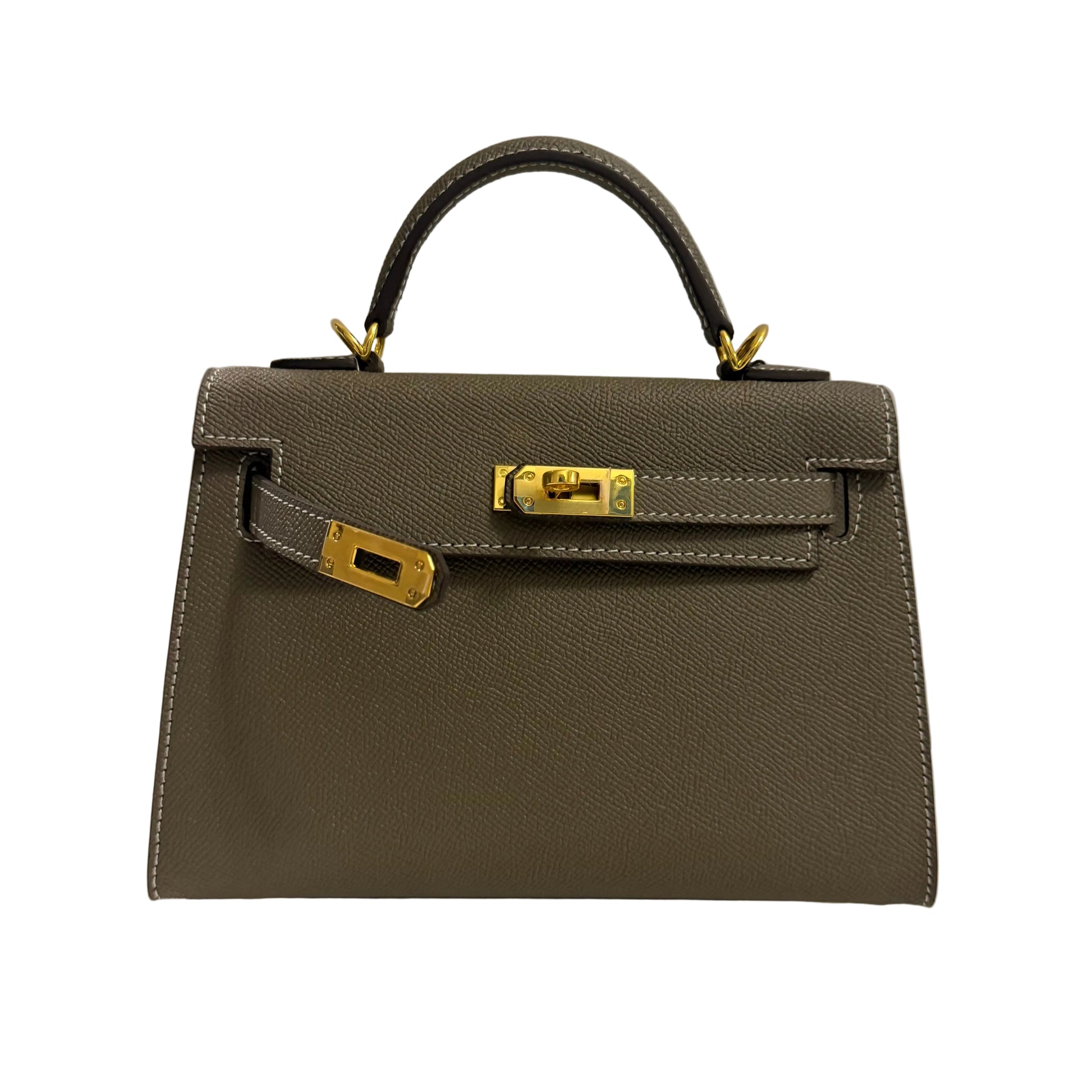 Brown handbag with gold hardware on a neutral background