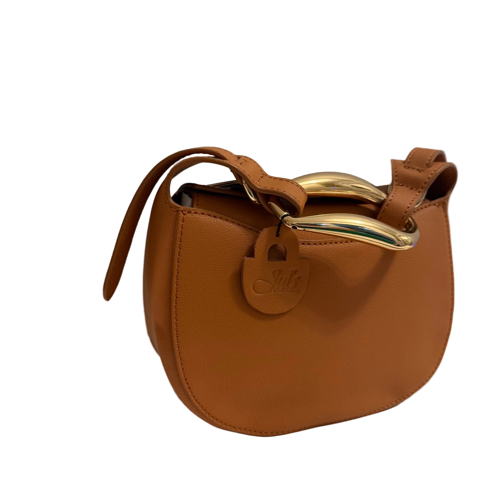 Brown handbag with gold accents on a white surface
