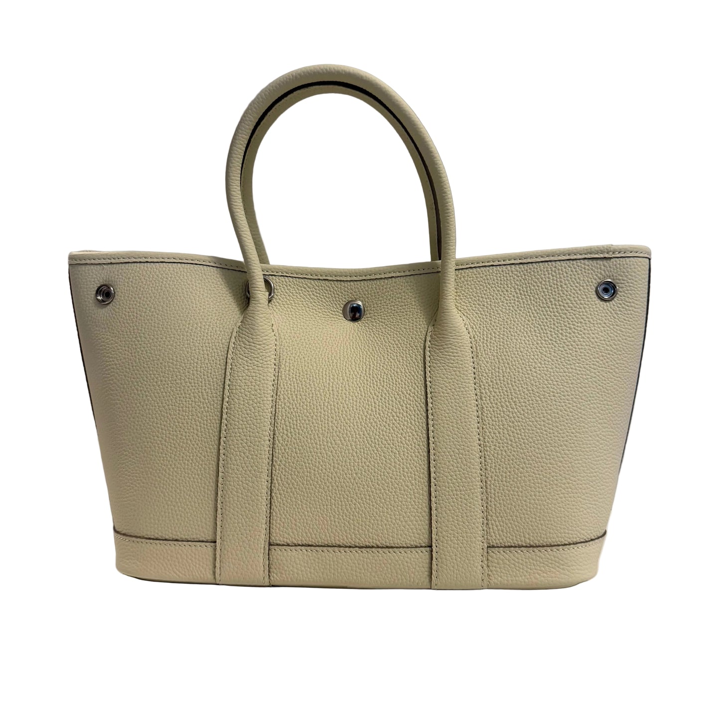 Beige handbag on a gray background