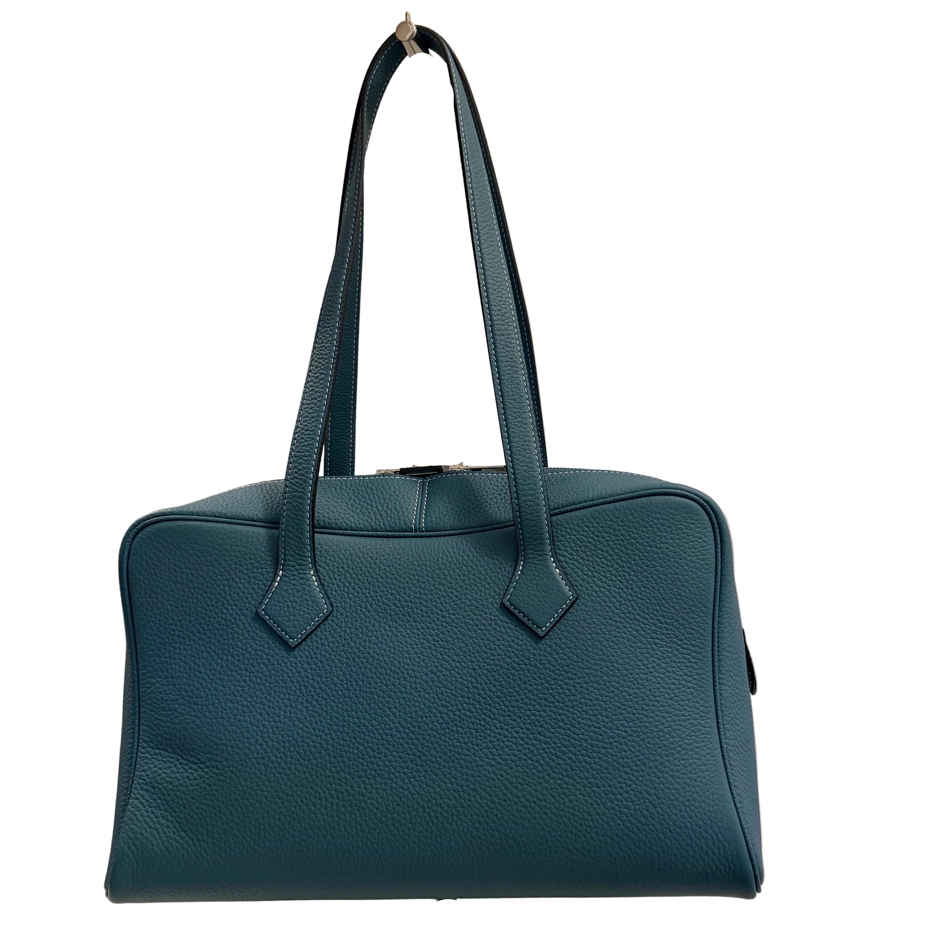 Blue handbag on a light gray background