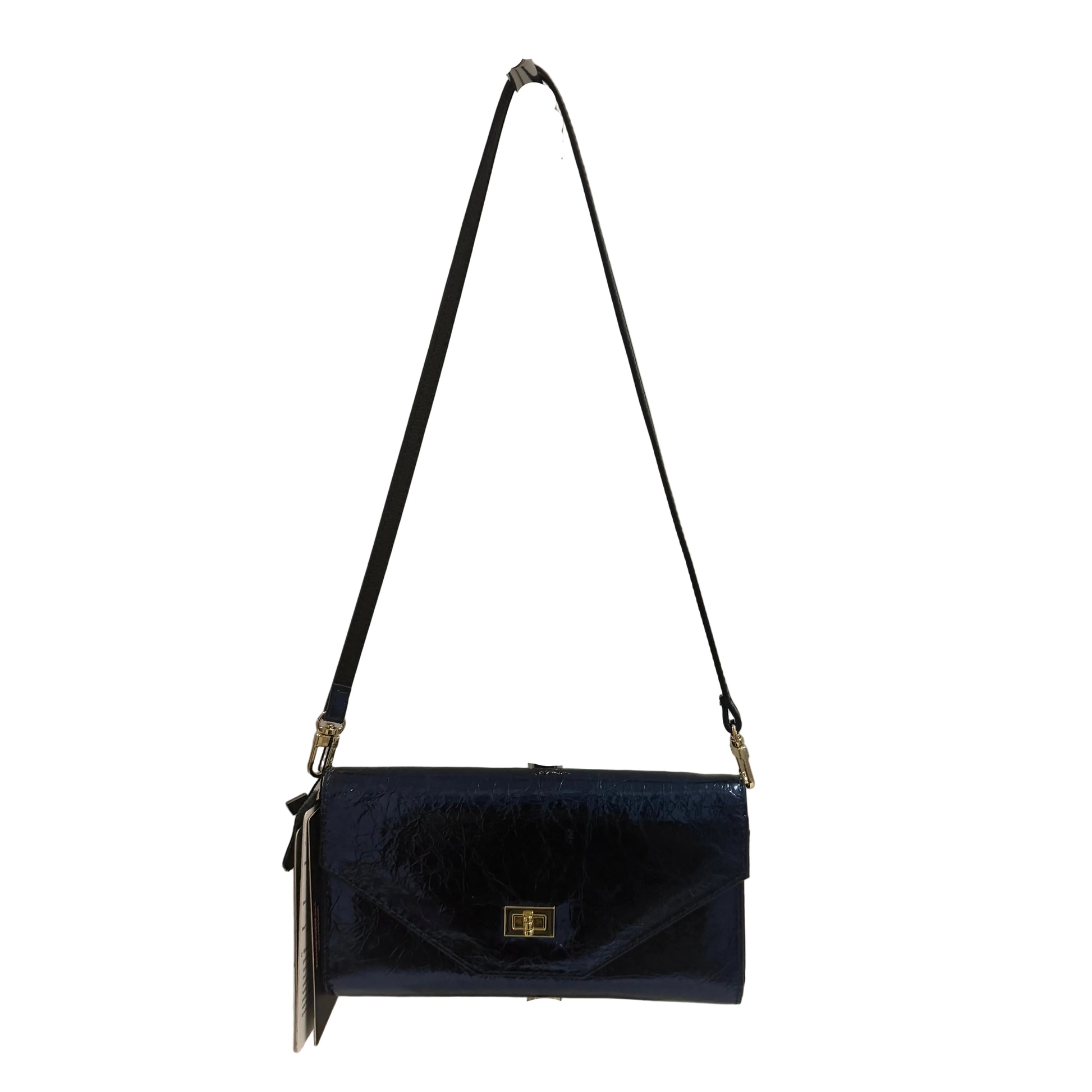 Navy blue handbag with a black strap on a gray background