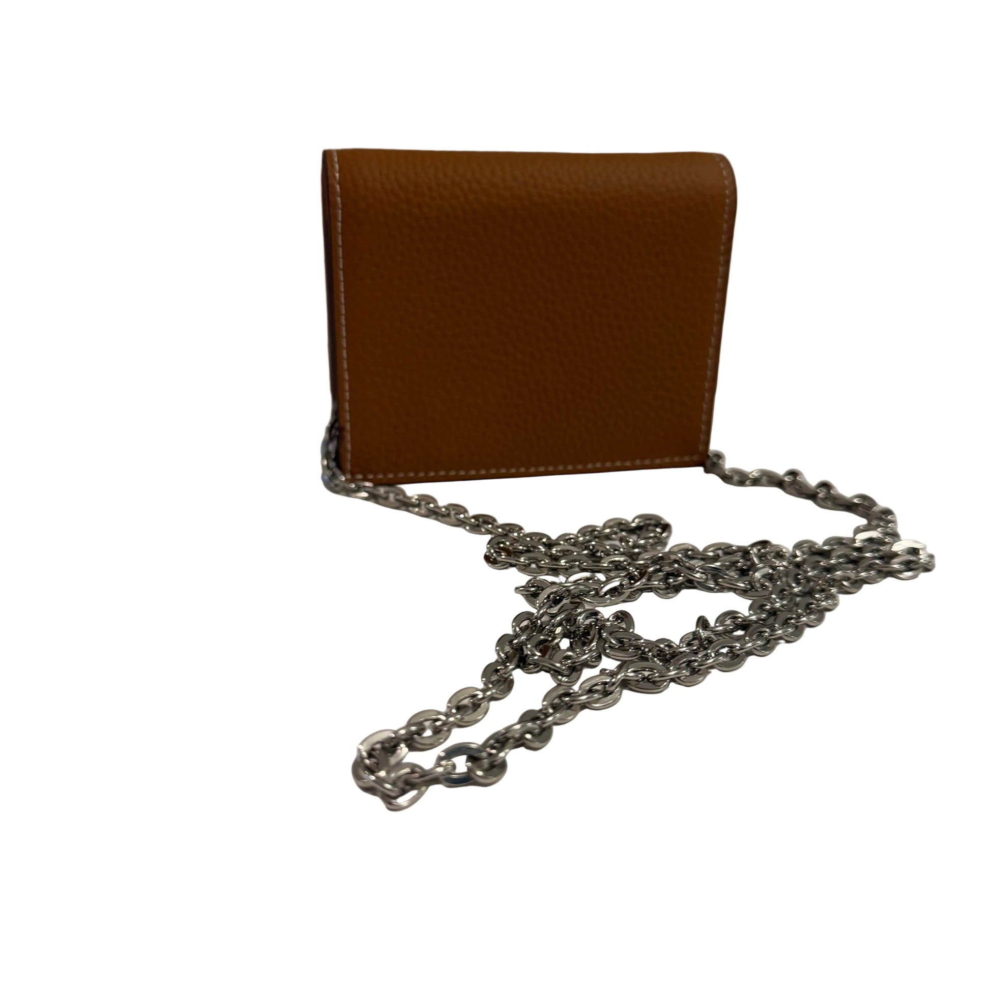 Brown leather wallet with a silver chain on a light surface