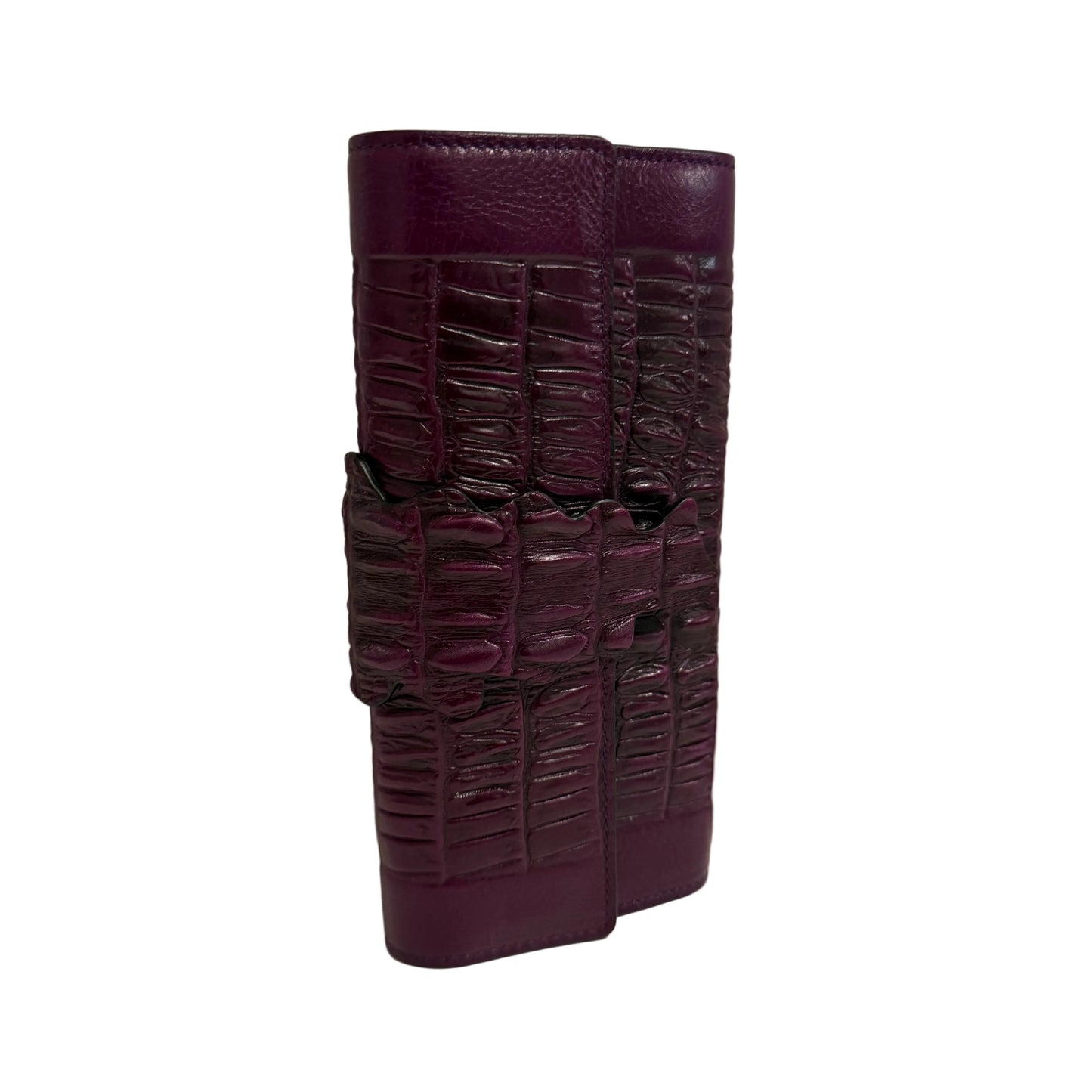 Purple textured wallet on a light gray background