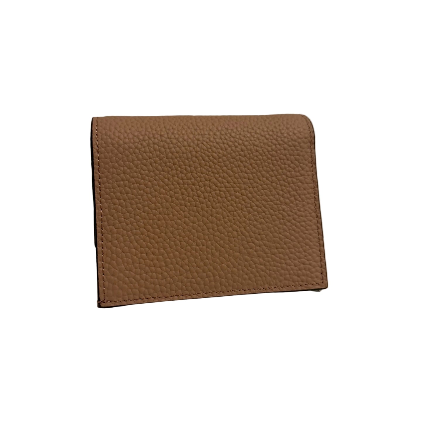 Brown leather wallet on a white surface with a gray background