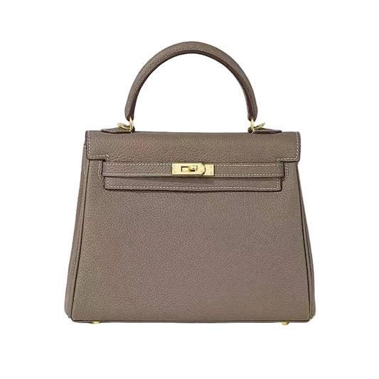 Gray handbag with a gold clasp on a white background