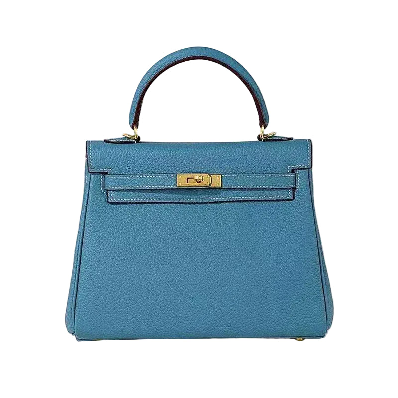 Blue handbag with gold clasp on a white background