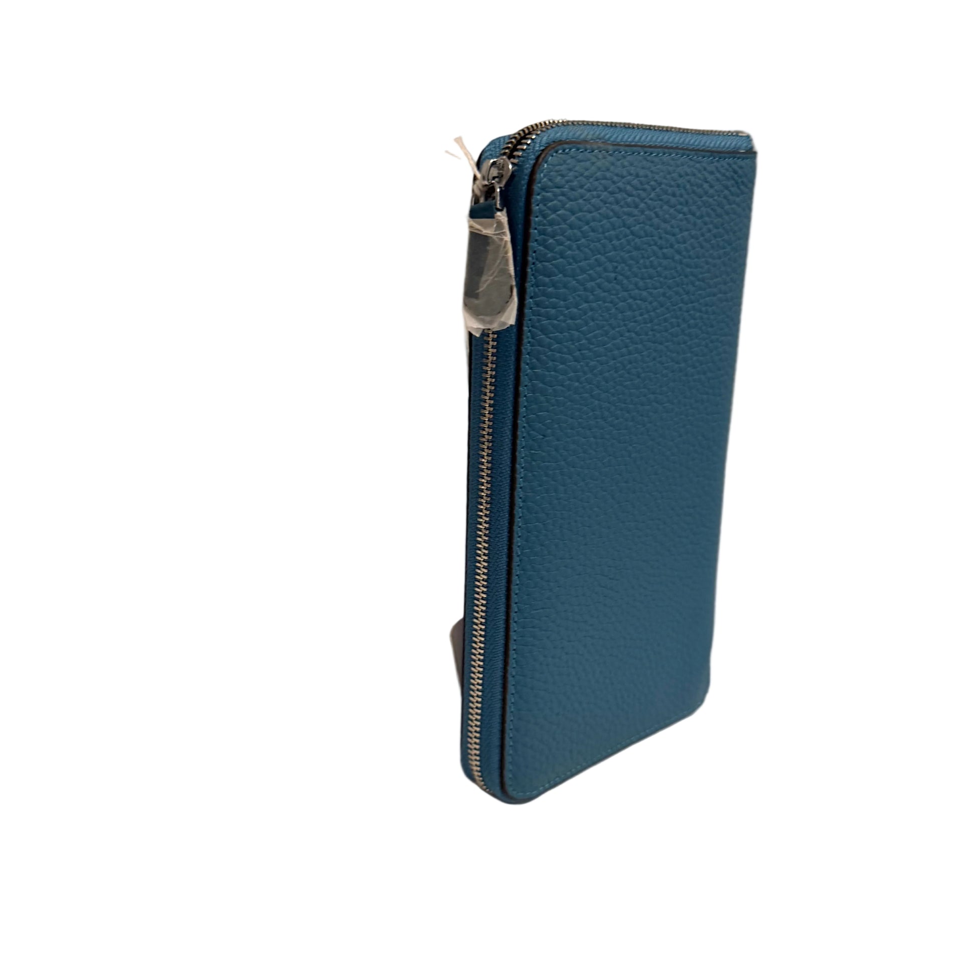 Blue textured wallet with a zipper on a neutral background