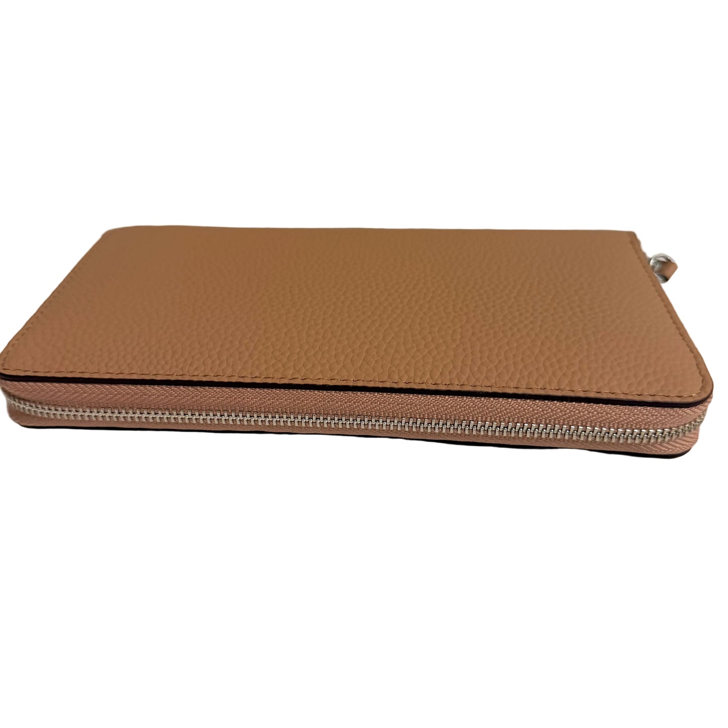 Brown leather zippered case on a white surface with a gray background