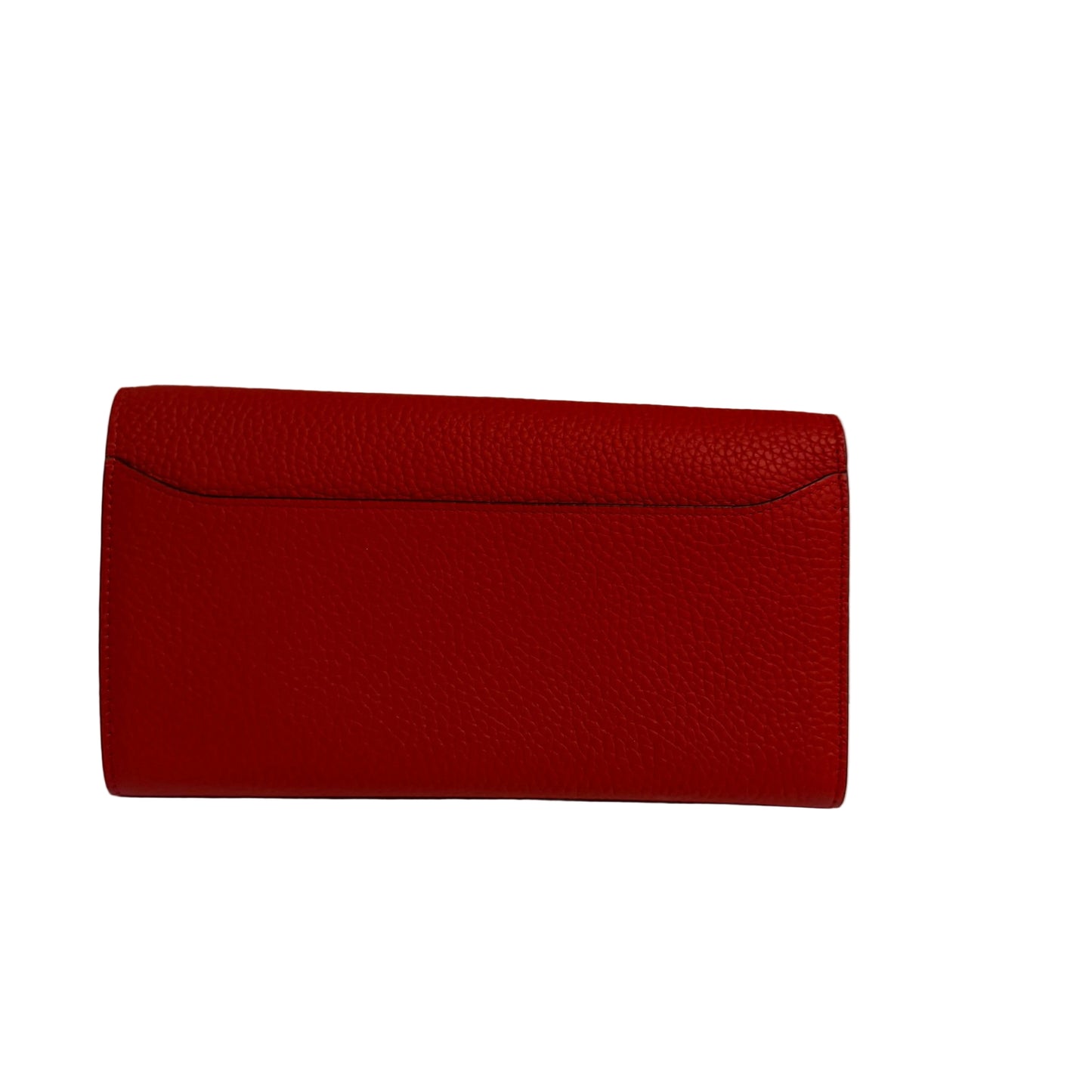 Red wallet on a white surface with a light gray background