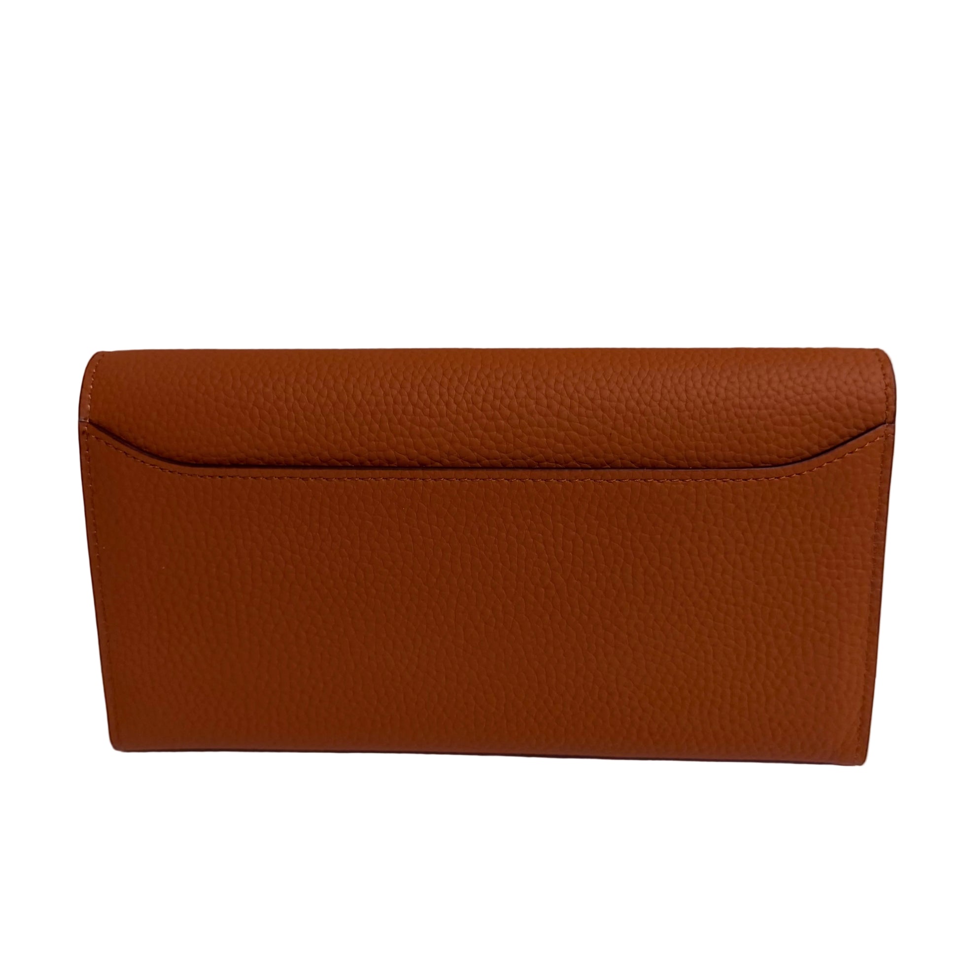 Brown leather clutch bag on a white surface with a light gray background