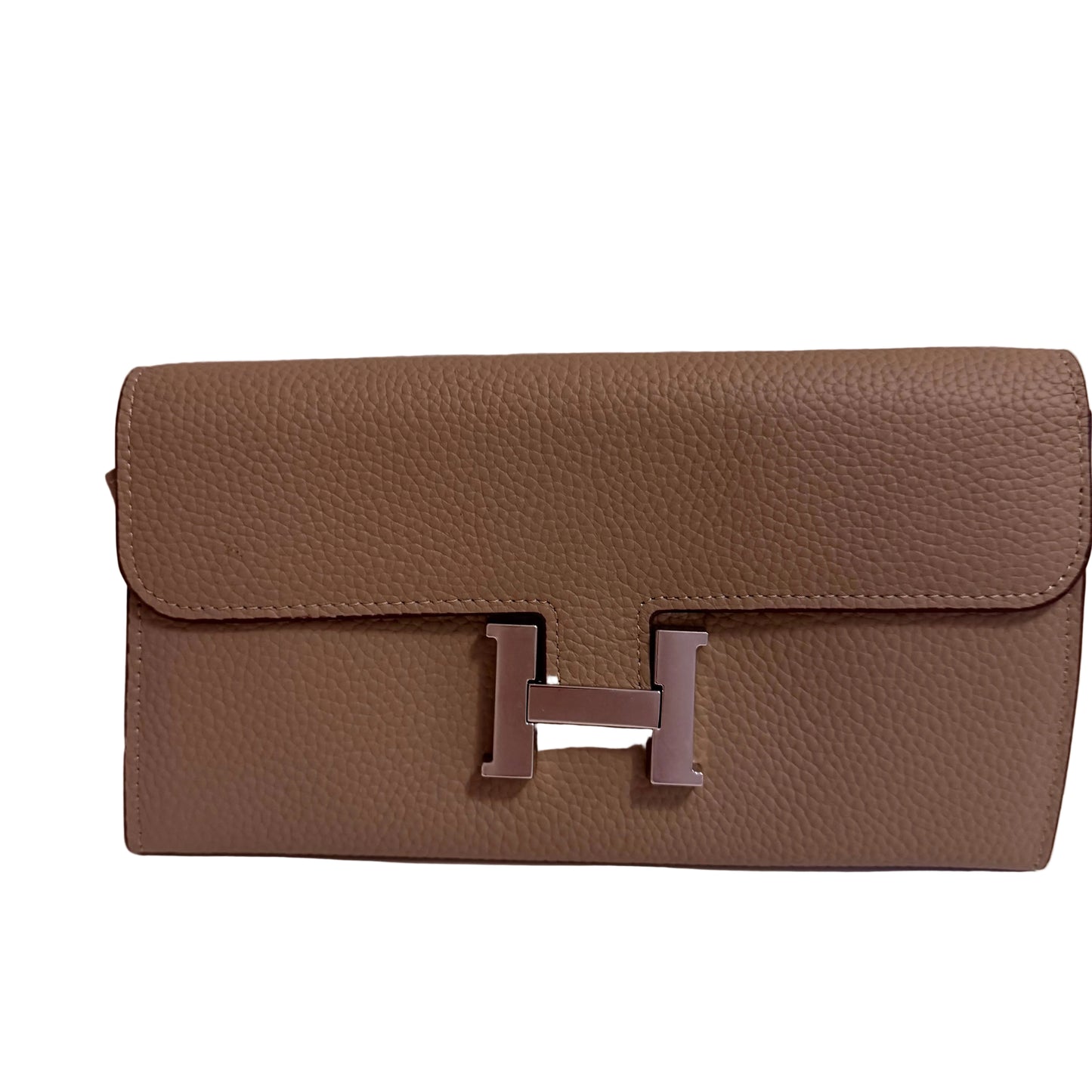 Brown leather clutch bag with a prominent 'H' logo on a light background