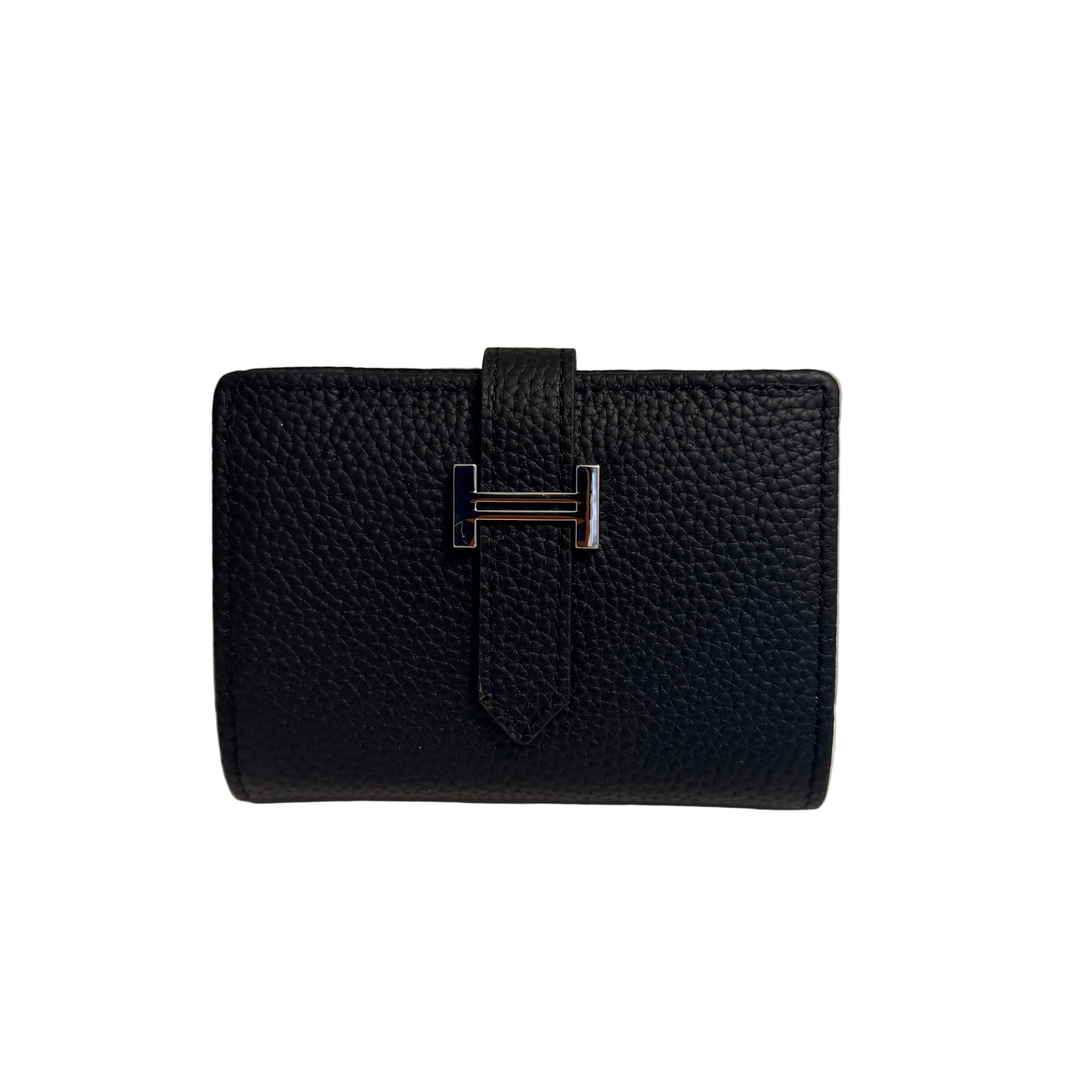 Black textured wallet with a silver buckle on a light gray background