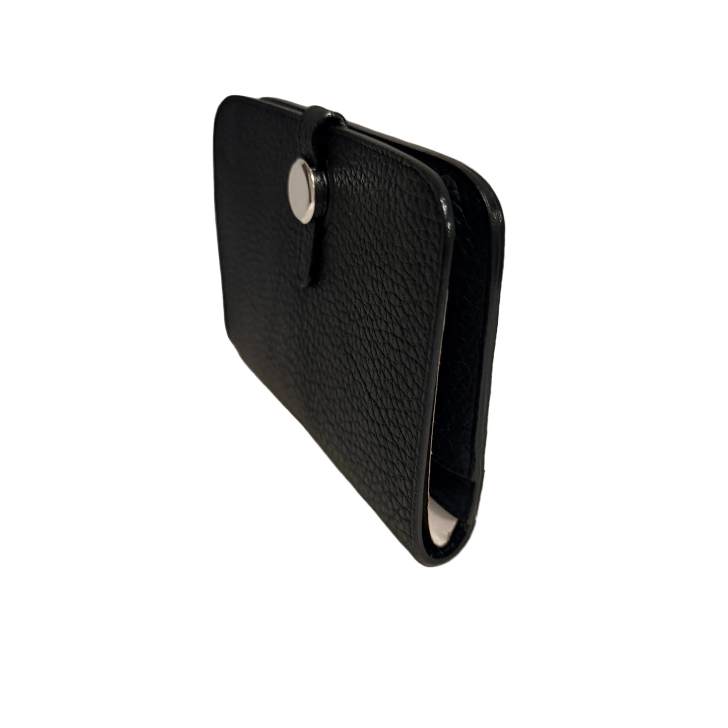 Black leather wallet on a white surface with a gray background