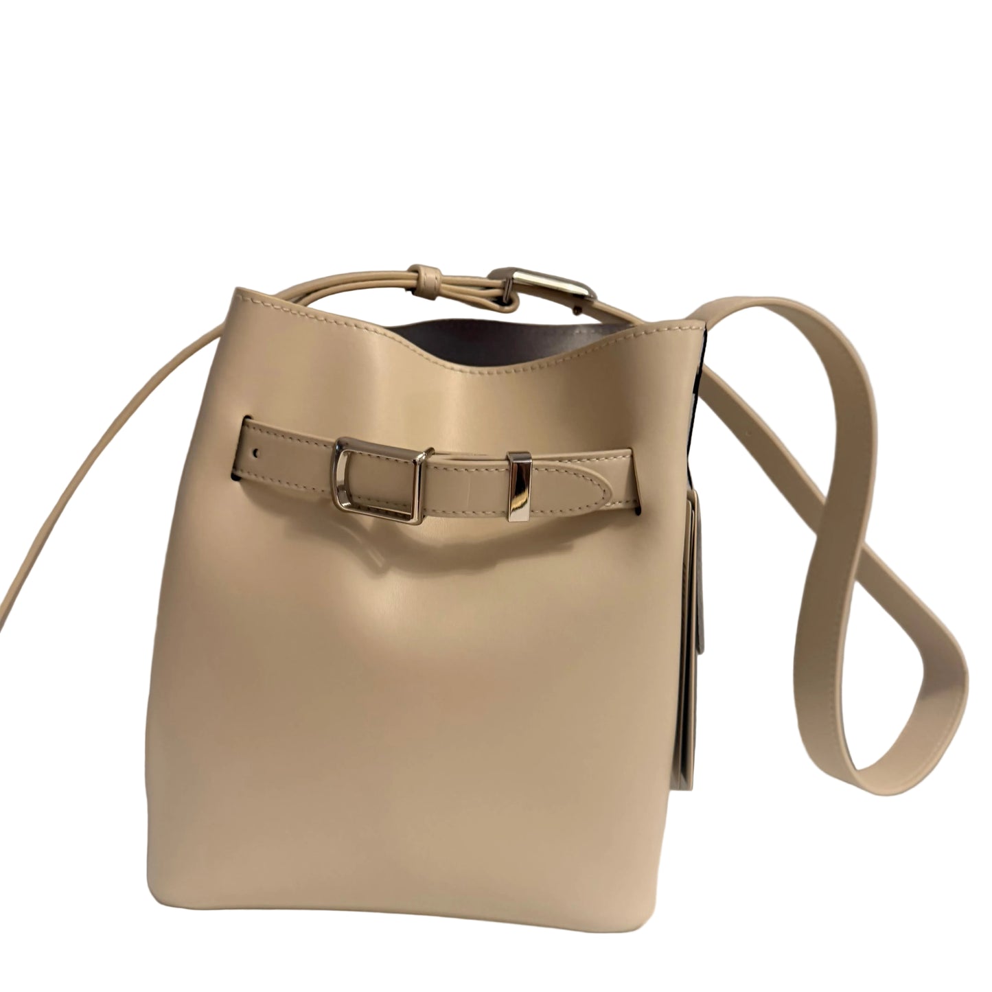 Beige handbag with a strap on a neutral background