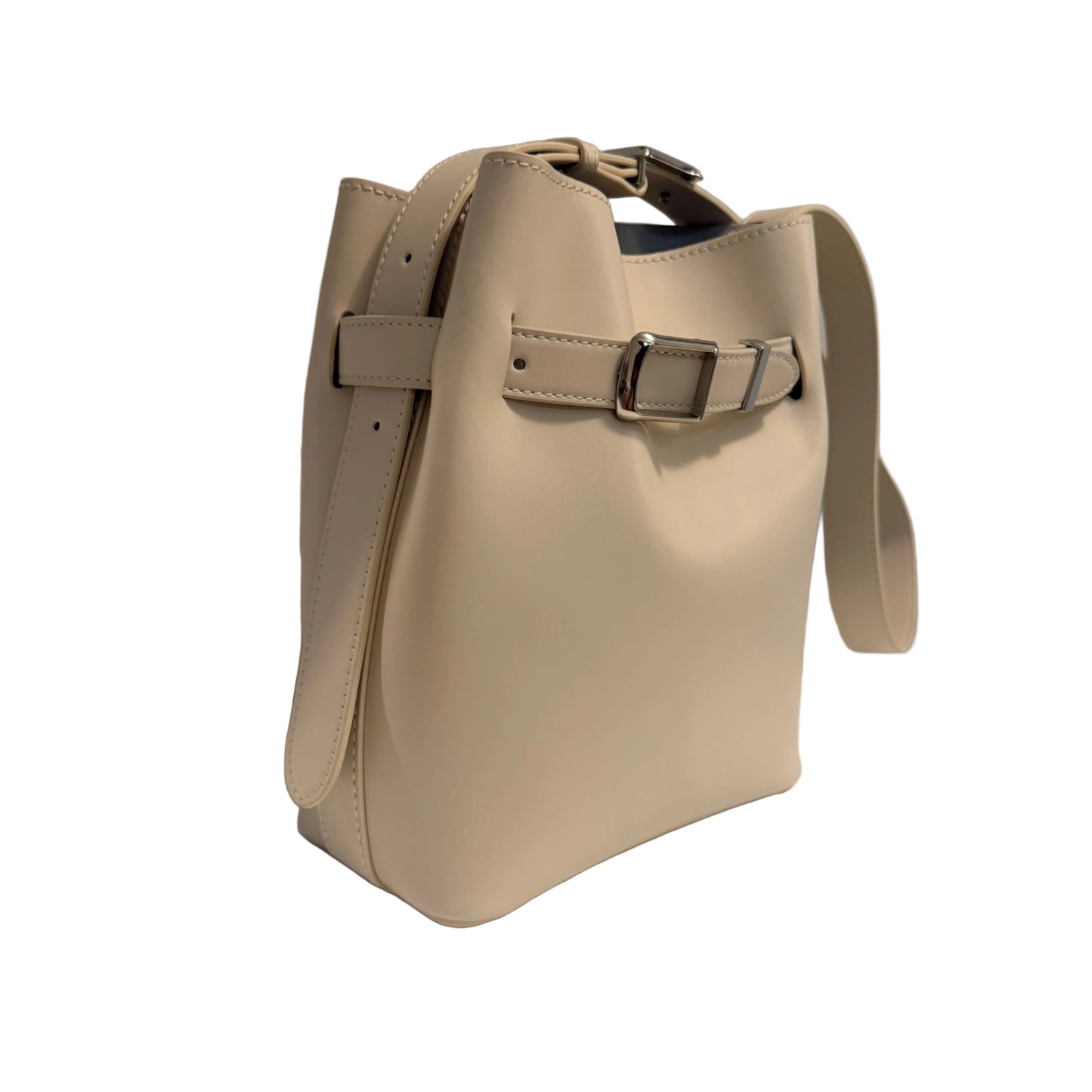 Beige handbag with a strap on a light gray background