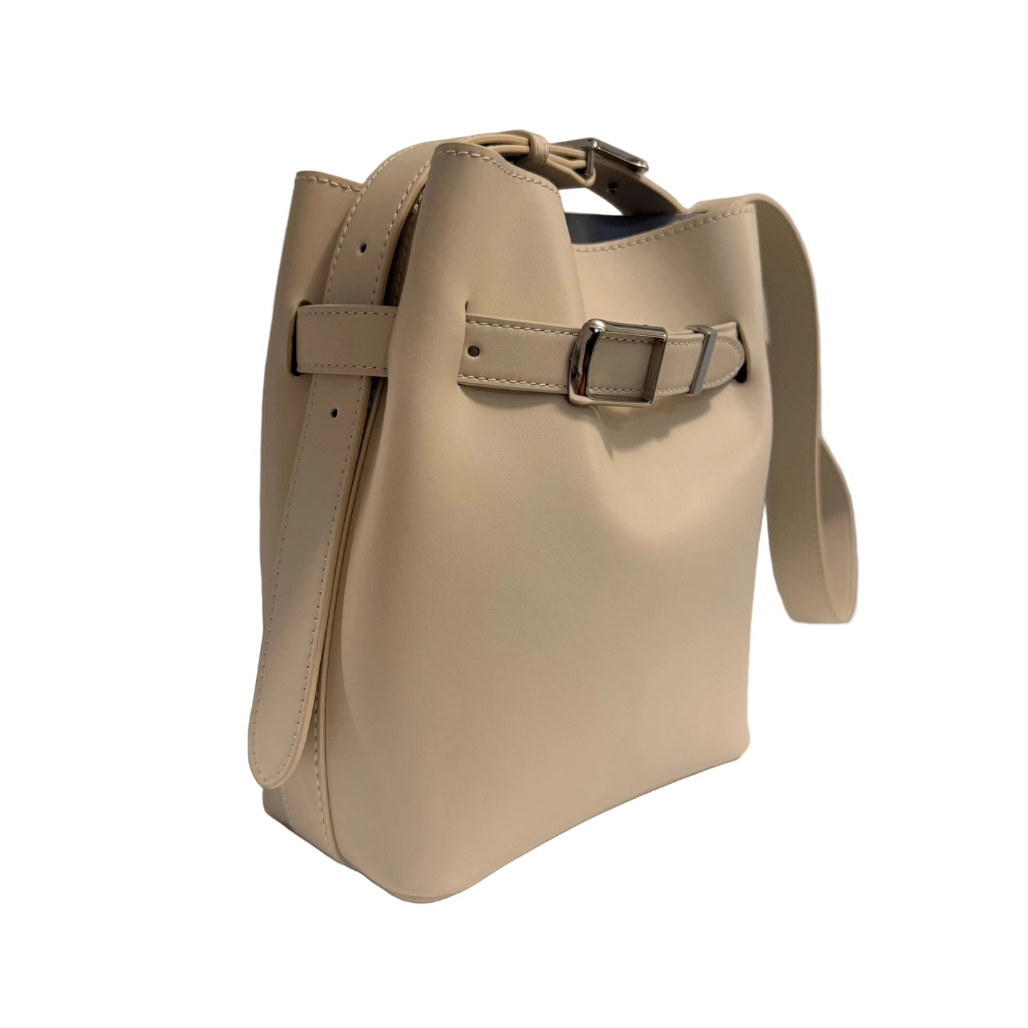 Beige handbag with a strap on a light gray background