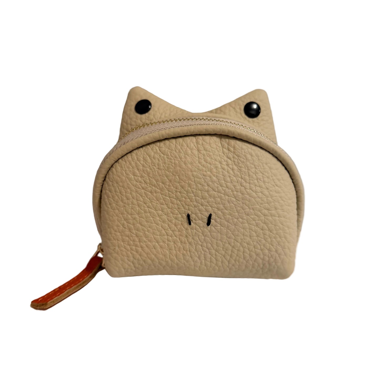 Beige pouch shaped like a cat with a zipper on a white surface.