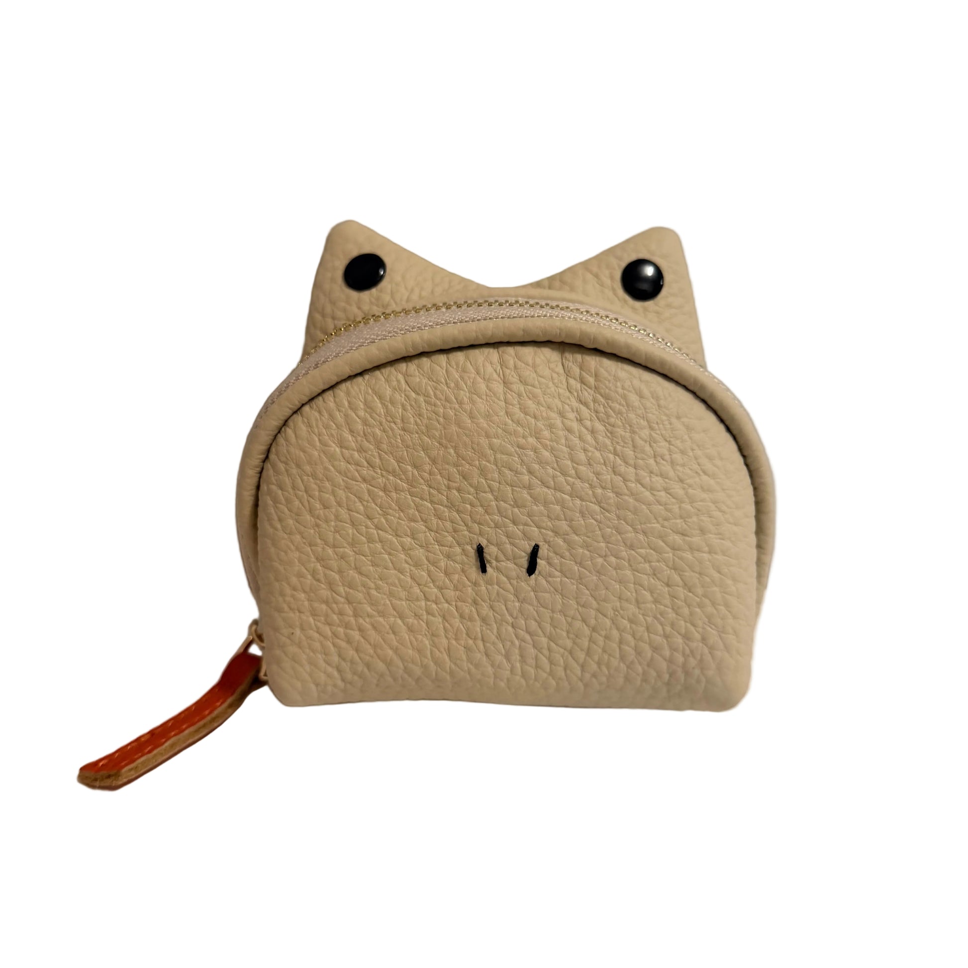Beige pouch shaped like a cat with a zipper on a white surface.