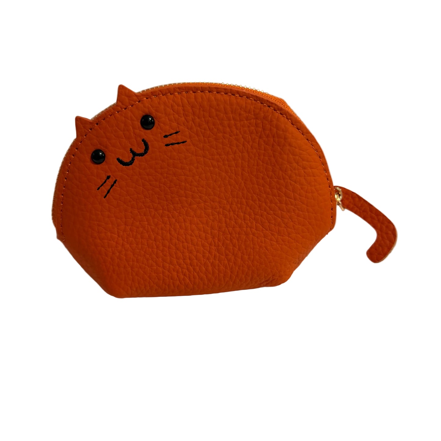 Orange cat-shaped coin purse on a white surface with a light gray background