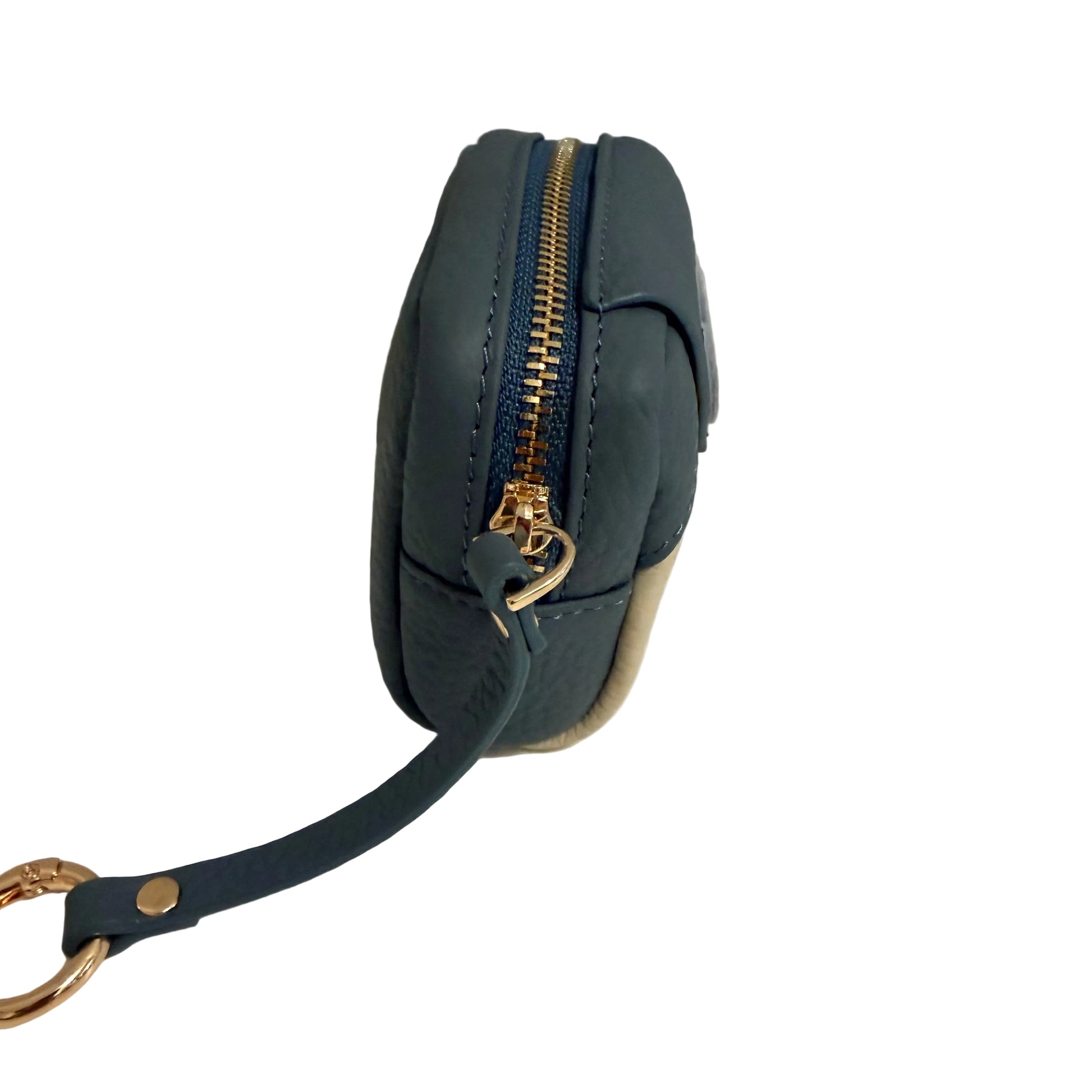 Navy blue handbag with gold zipper and chain on a light gray background