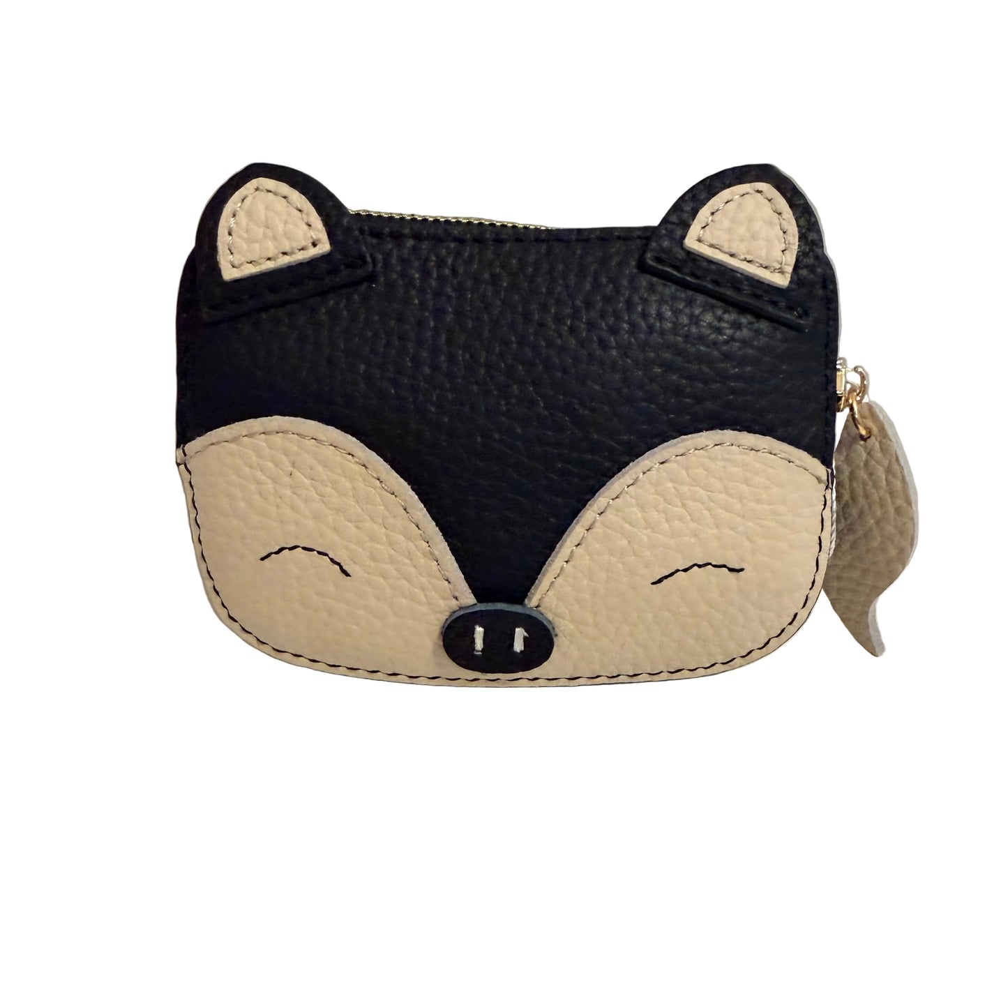 Fox-shaped coin purse with black and beige design on a white surface.
