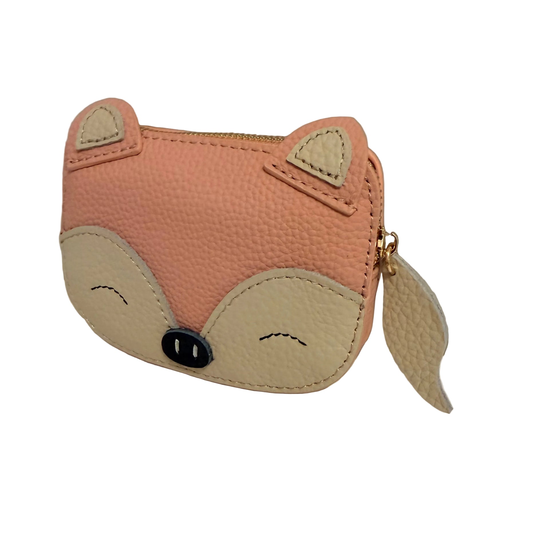 Fox-shaped coin purse on a white surface with a neutral background