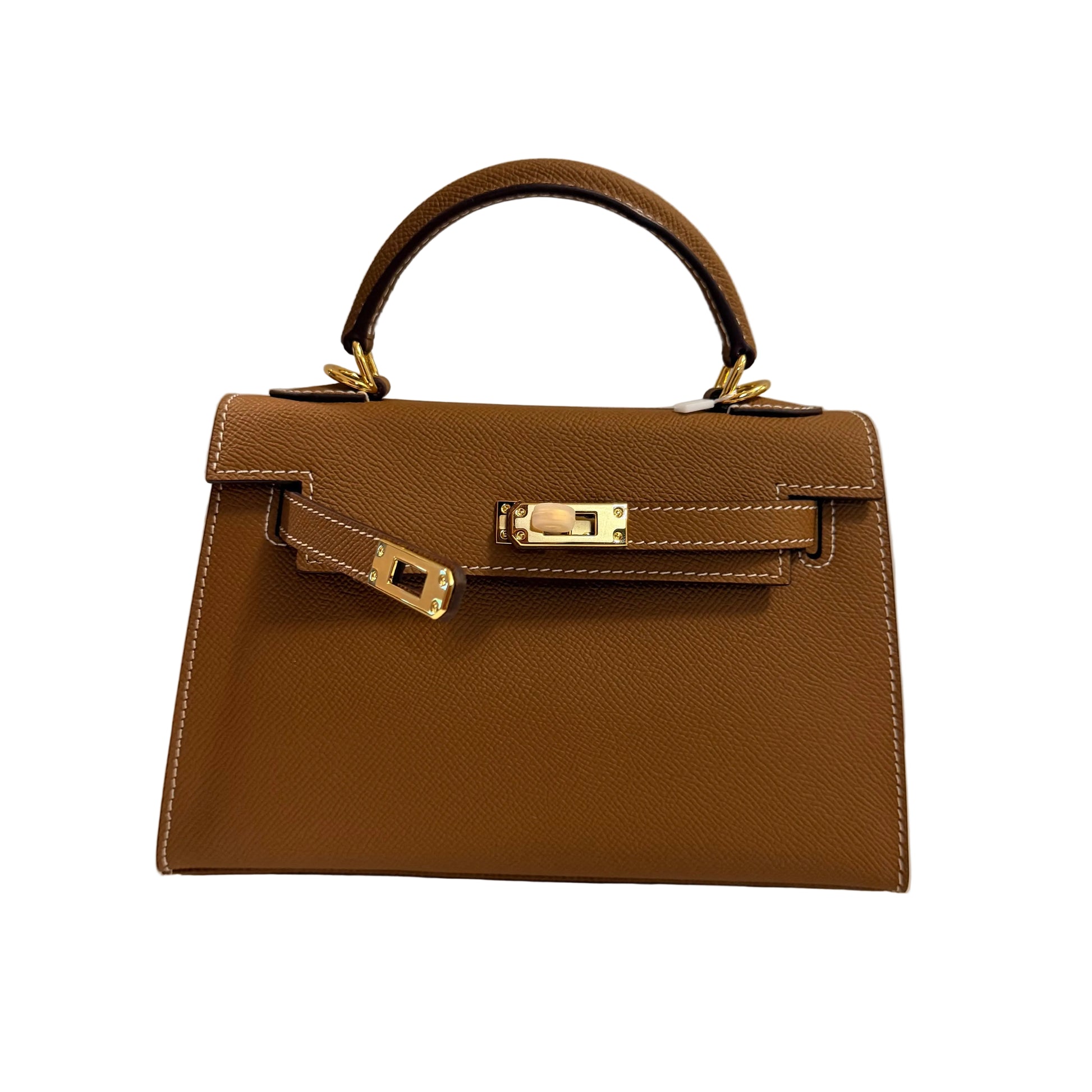 Brown handbag with gold hardware on a neutral background