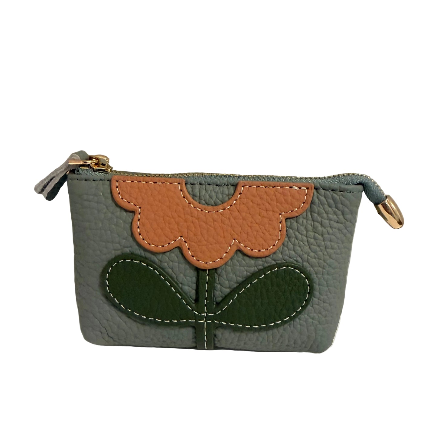 Small pouch with floral design on a gray background