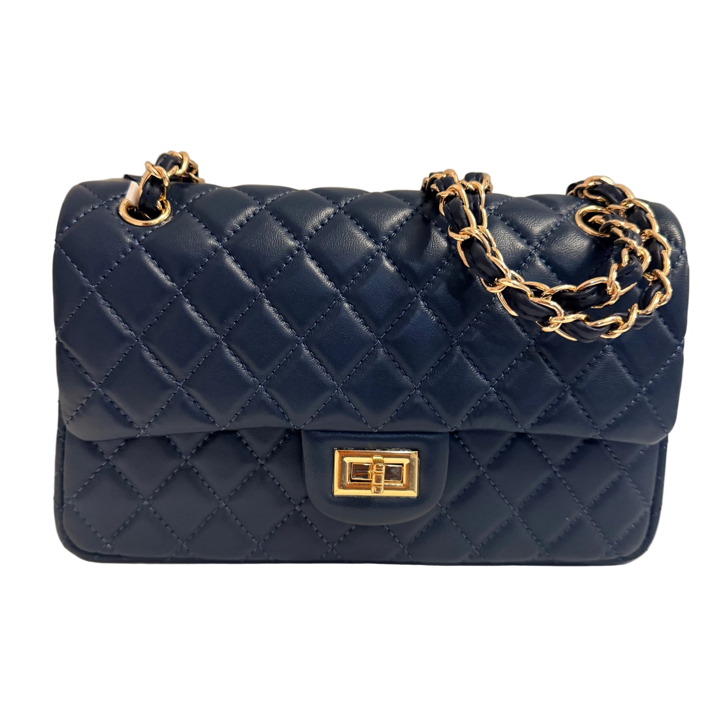 Blue quilted handbag with gold chain and clasp on a neutral background