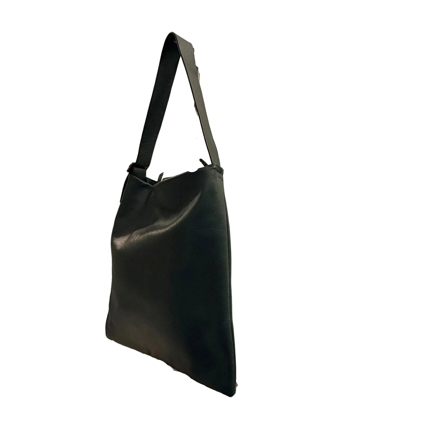 Black leather handbag on a stand against a neutral background