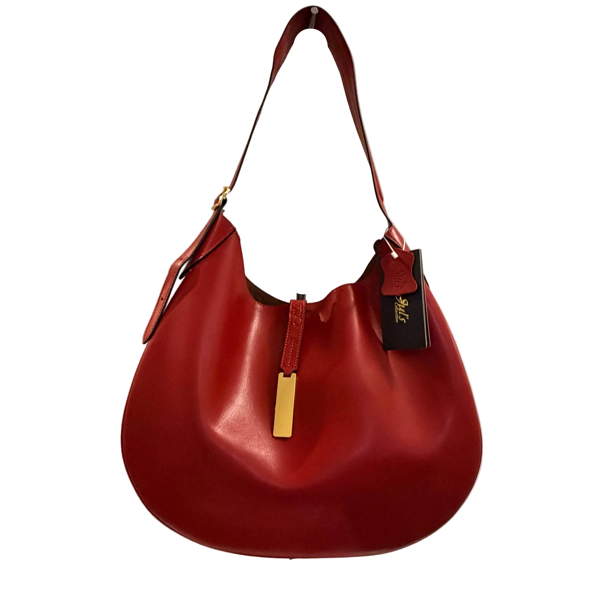 Red handbag with a gold tag on a neutral background
