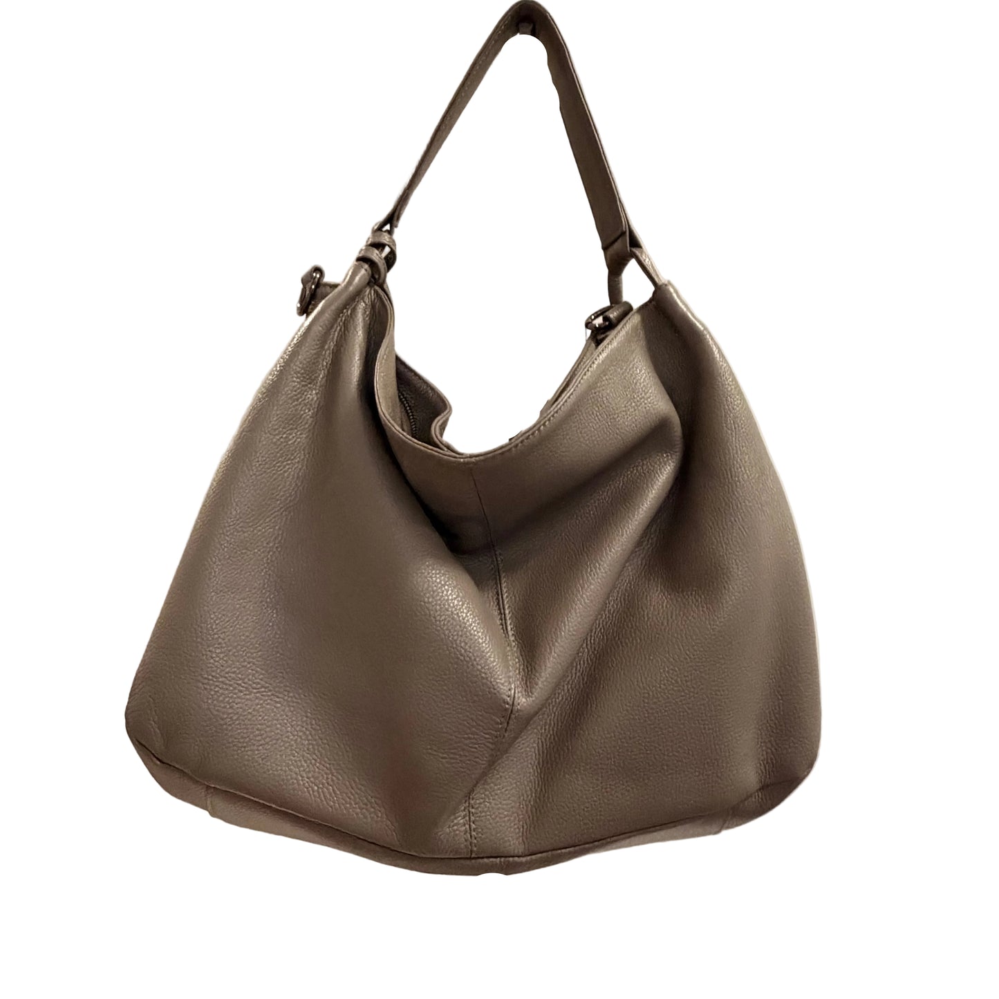 Gray handbag on a stand against a neutral background